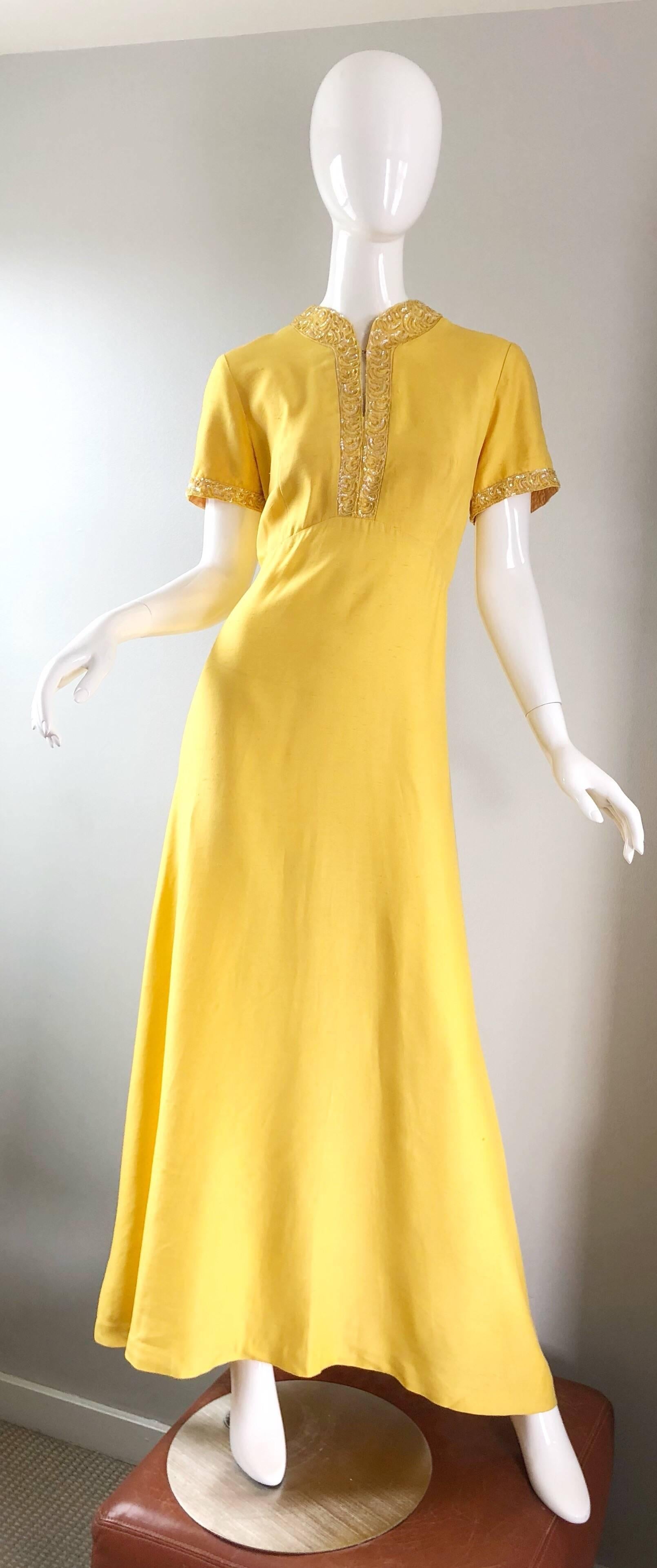 Beautiful vintage 70s does 40s canary yellow silk shantung maxi dress / gown! Features a luxurious yellow raw silk shantung. Fitted bodice with a forgiving flattering skirt. Hundreds of hand-sewn iridescent sequins adorn the neckline and each sleeve