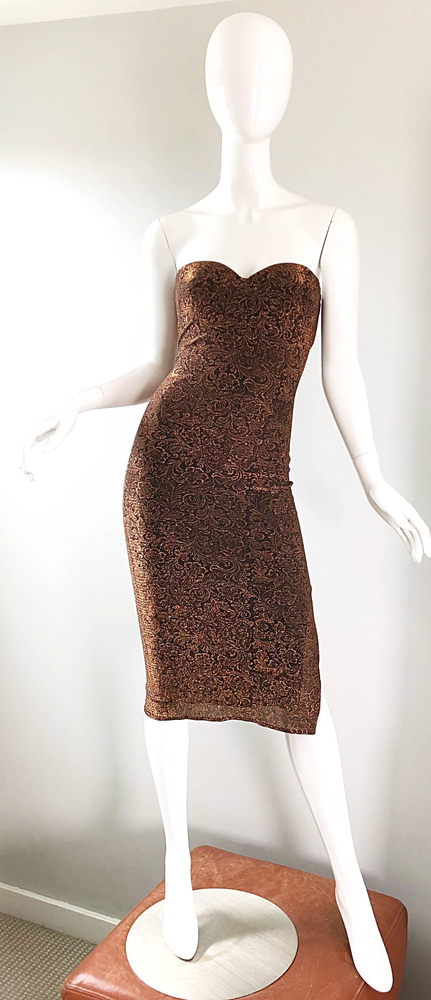 Sexy 90s does 50s vintage ELETRA CASADEI metallic bronze / copper bodycon convertible strap wiggle dress! Dress can be worn with attached adjustable black straps, or as a strapless dress with straps simply tucked in. Stretch bronze jersey fabric