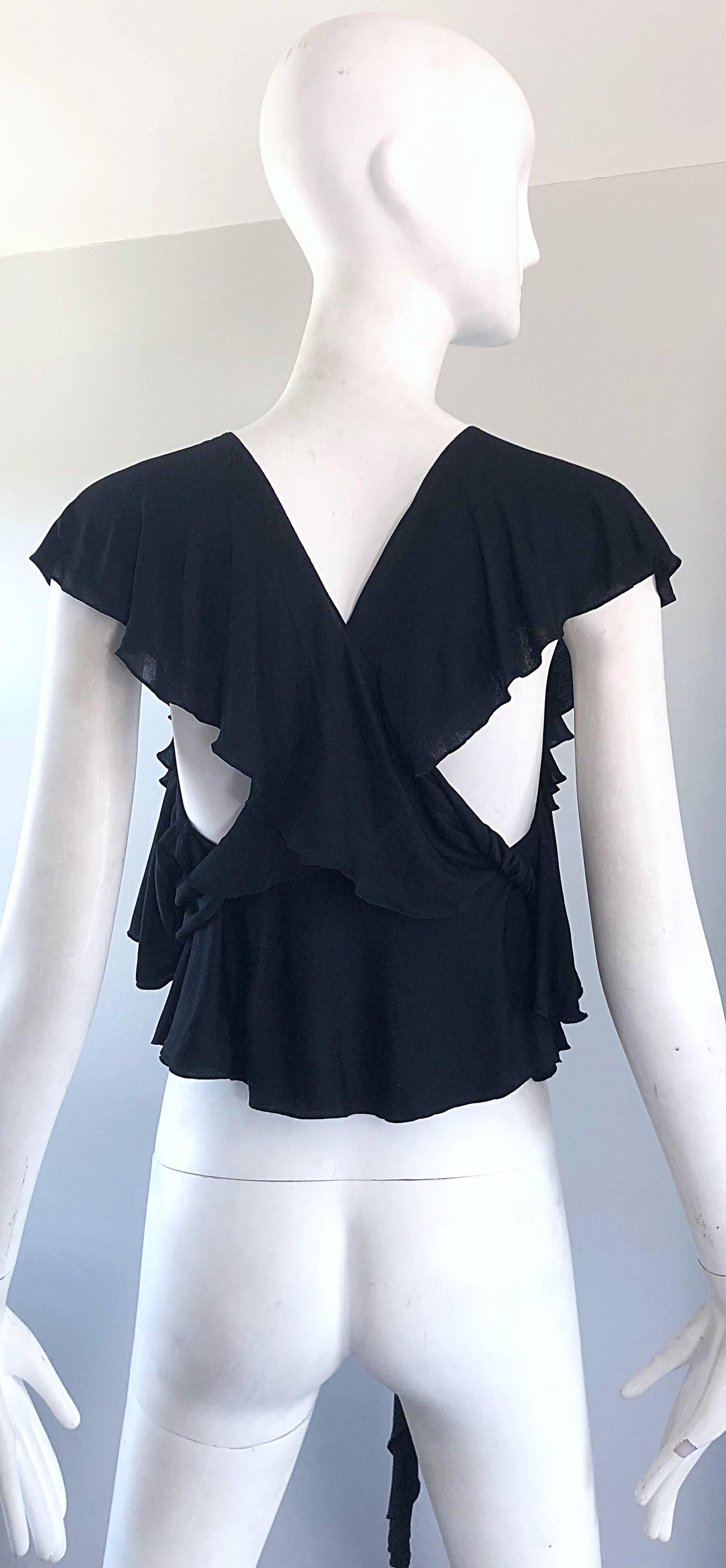 Rare early label vintage 1970s HOLLY'S HARP black silk jersey boho wrap top! Features a stretch silk jersey with a unique innovative style. Wraps over the shoulders into a racerback, then ties around the waist. An amazing take on a halter top! Can