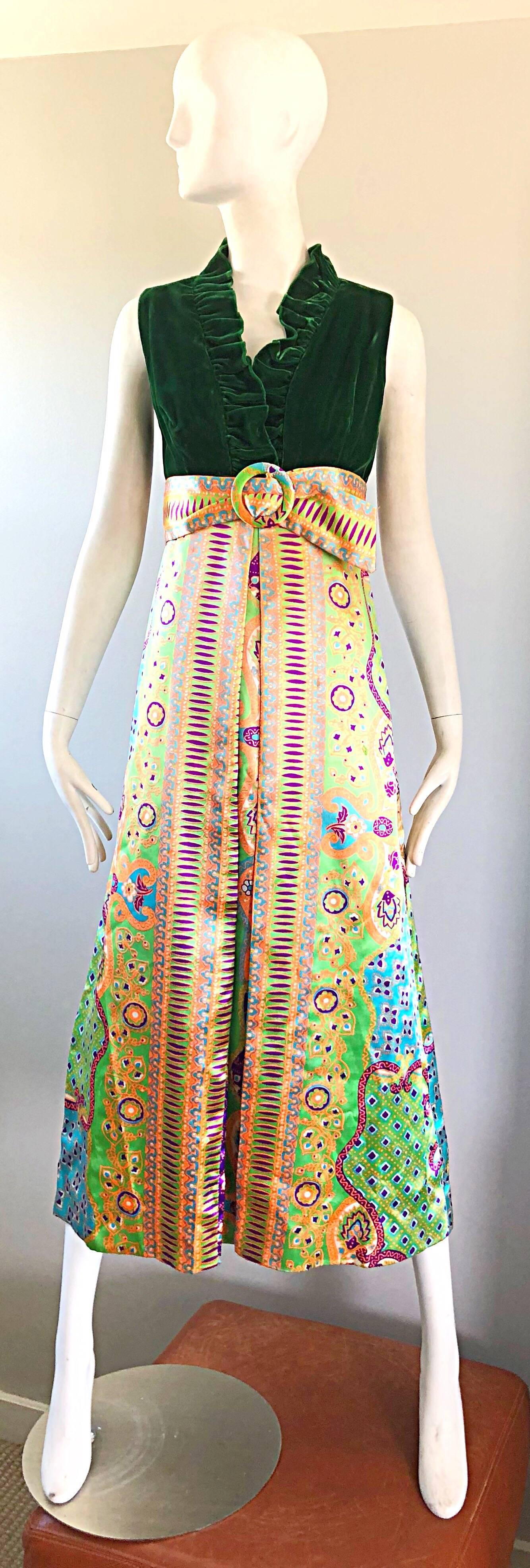 Spectacular 70s OSCAR DE LA RENTA silk and velvet psychedelic print colorful maxi dress! Features a fitted deep green velvet bodice with ruffles along the neckline. Hidden snaps allow control of cleavage. Attached silk skirt has psychedelic prints