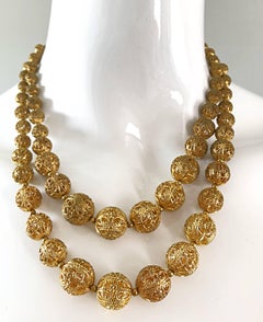 Remarquable collier vintage à double brin en filigrane d'or avec boules gravées des années 1950