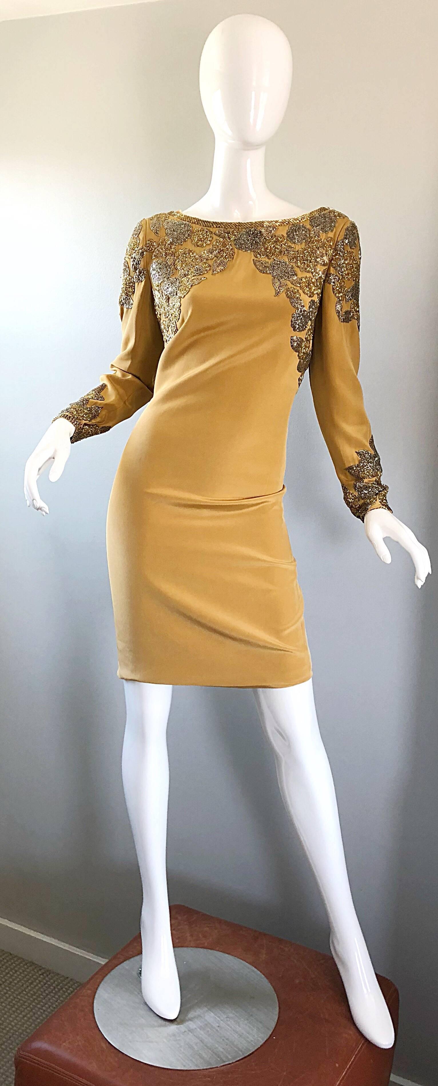 Beautiful 1990s OLEG CASSINI gold beaded silk dress! Features thousands of hand-sewn gold and silver seed beads along the top front and back bust and sleeves. Wonderful tailored fit, with sleek long sleeves. Hidden zipper up the back with