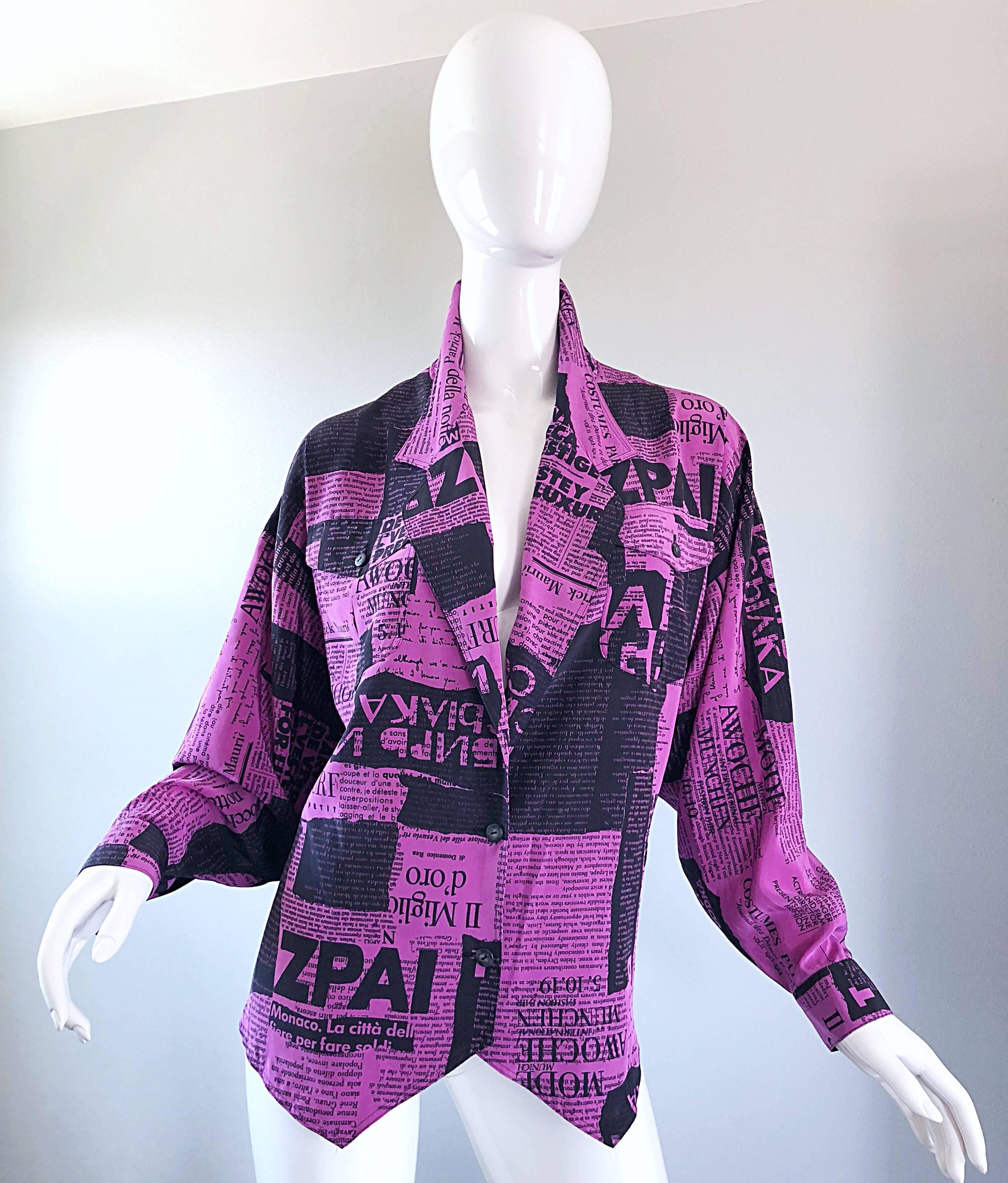 Amazing 1980s purple and black newspaper print lightweight jacket! Features a lilac purple color base with black newspaper print in French. Two buttons up the front center, and at each sleeve cuff. Pocket at each breast. Chic dolman sleeves make