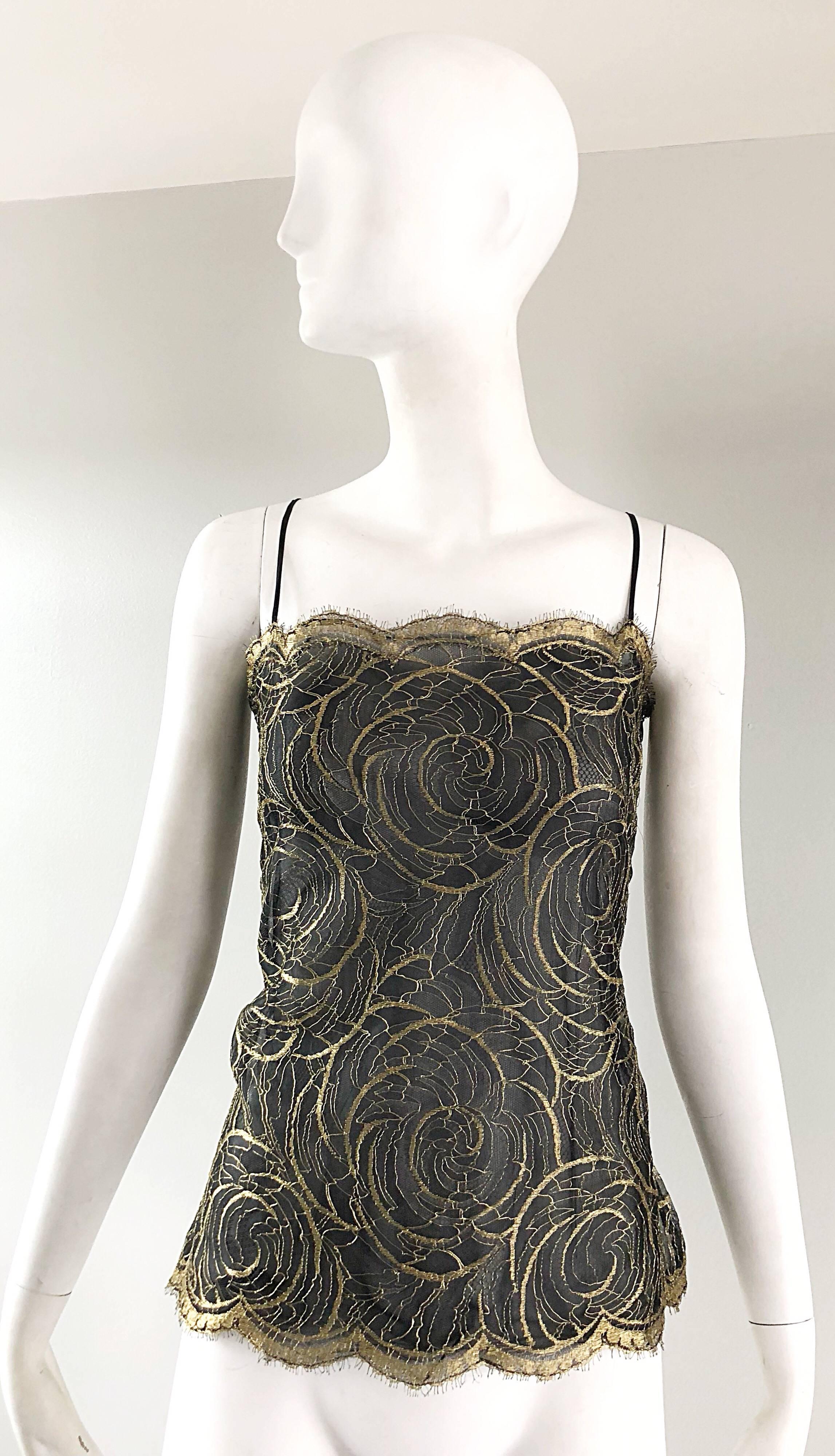 Gorgeous vintage 70s VALENTINO couture gold nad black French Lace semi sheer silk chiffon sleeveless blouse! Features two layers of black semi sheer silk chiffon with a French Lace overlay. Hidden zipper up the side with hook-and-eye closure.