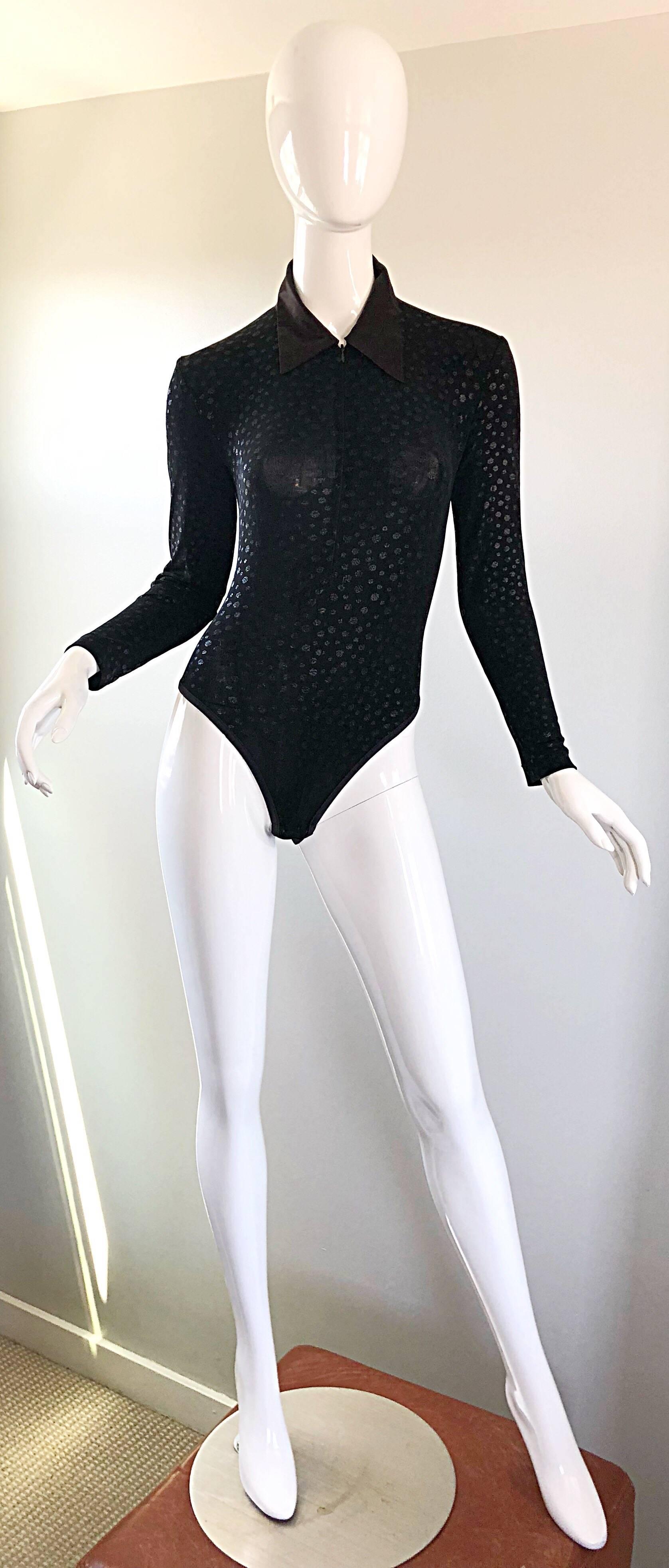 Sexy 90s MY MAILLE, of Paris, France black iridescent metallic long sleeve zipper bodysuit! Features a soft stretchy viscose material that stretches to fit. Full zipper up the front allows to control cleavage. Great with shorts, jeans, or a skirt.