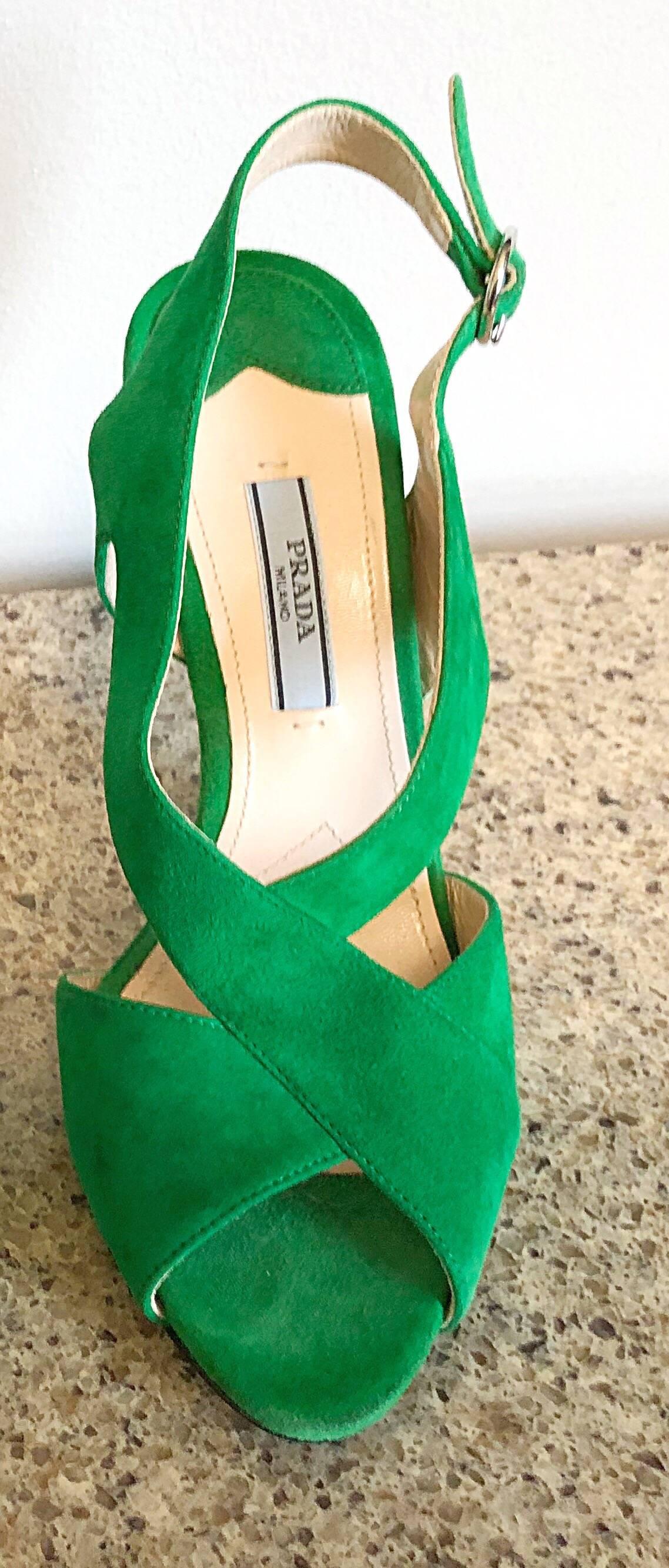 Fabulous brand new PRADA kelly green runway open toe heels! Vibrant green color on an architecturally appealing design. Adjustable strap can fit an array of ankle sizes. Extremely comfortable shoes that are easy to wear all day. The perfect pop of