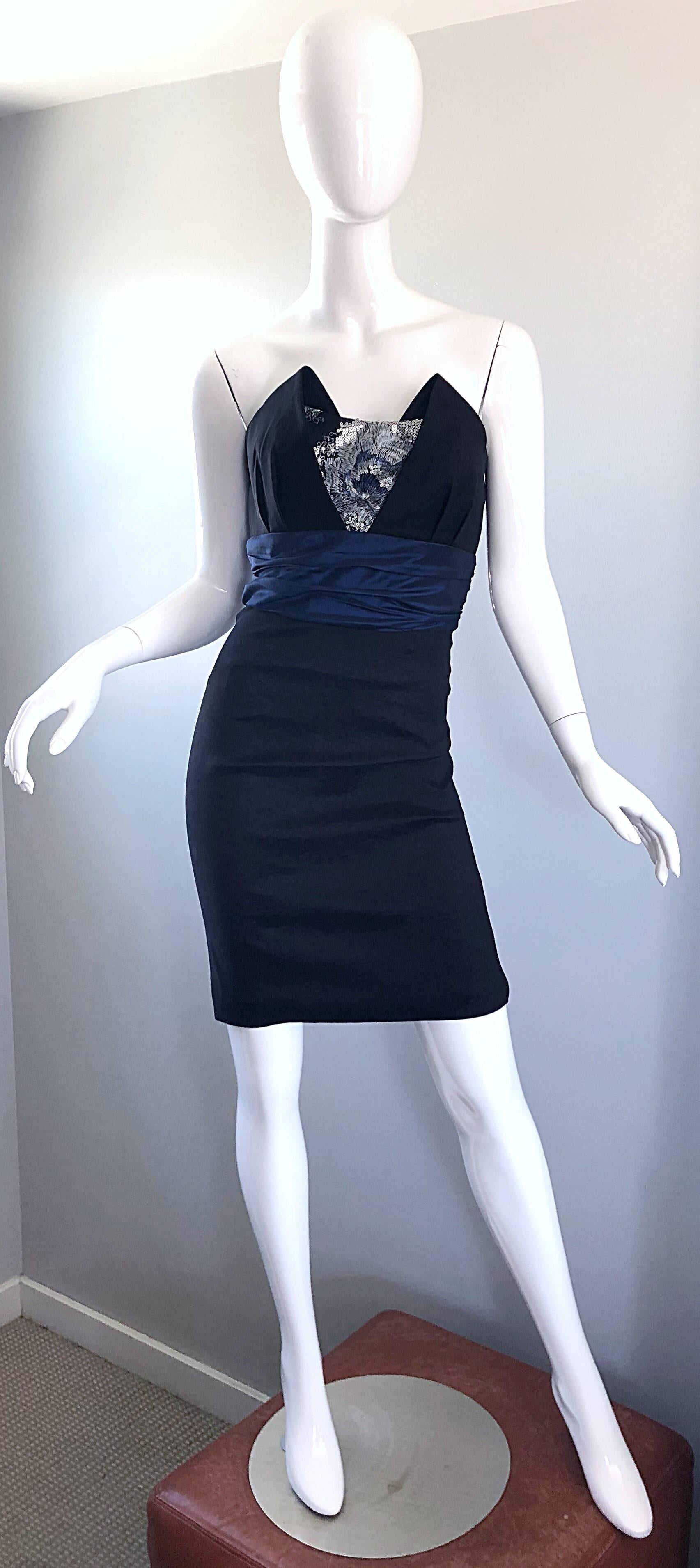 Sexy early 2000s BADGLEY MISCHKA black and navy blue sequined Avant Garde strapless Y2K vintage mini dress! Features a black body with a navy blue band across the waist. Hundreds of tiny silver and blue sequins at the bust. Hidden zipper up the back