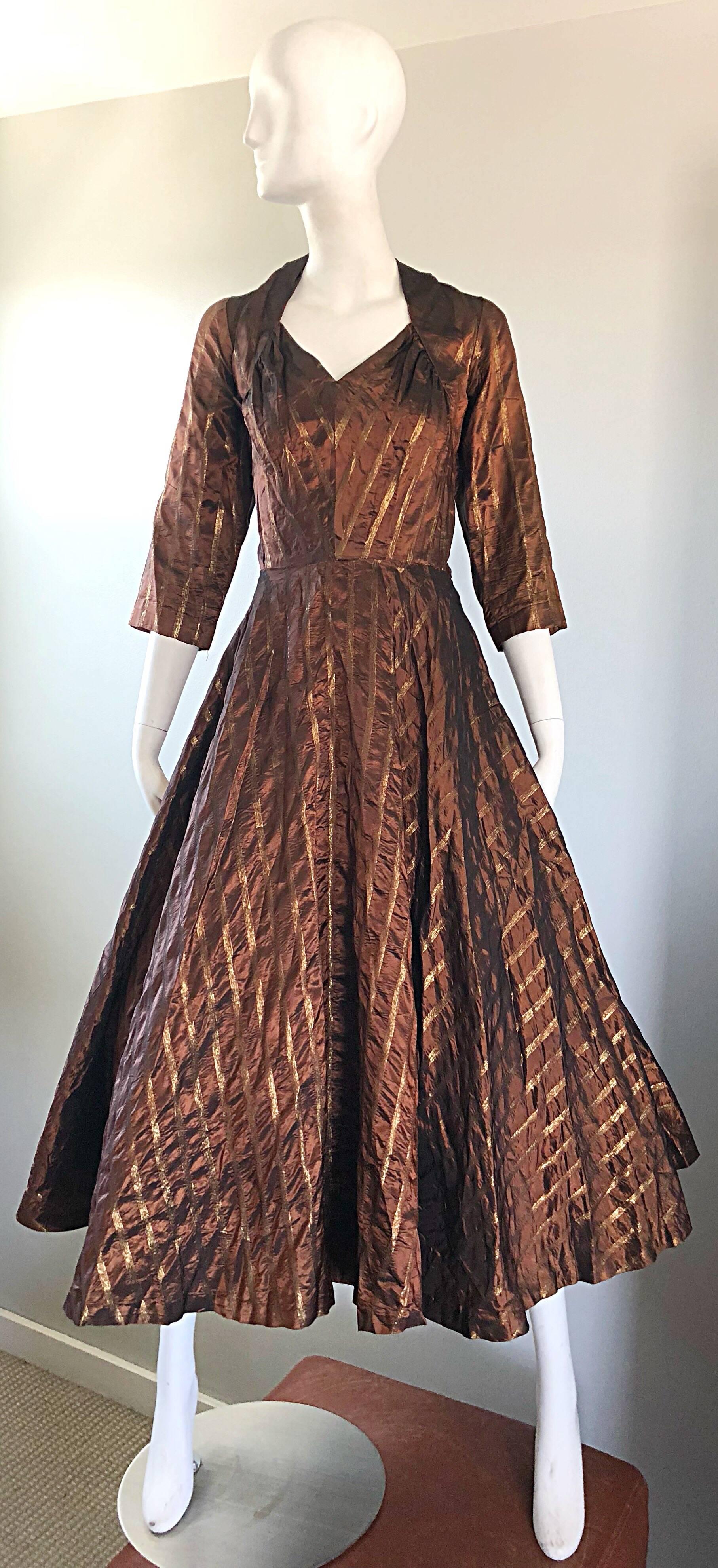 Gorgeous 50s DONALD ORIGINALS copper / bronze metallic silk fit n' flare cocktail dress! Features flattering golden bronze stripes throughout. Puckered neckline has so much detail. Tailored fitted bodice with a forgiving full skirt that could