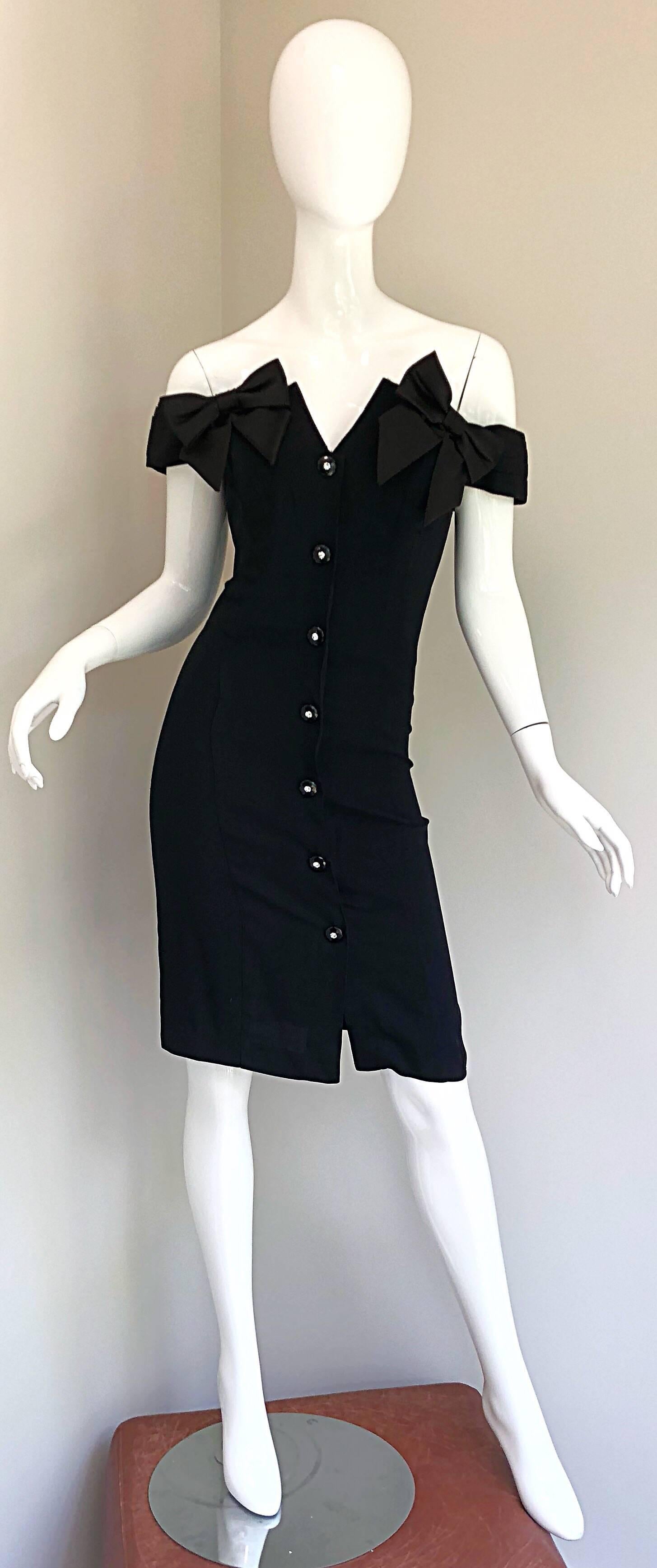 Sexy 90s off-the-shoulder Avant Garde little black dress LBD ! Features black lacquer / rhinestone buttons up the front. Bow details at each shoulder. Wonderful flattering bodycon fit hugs the body in all the right places. Hidden zipper up the back