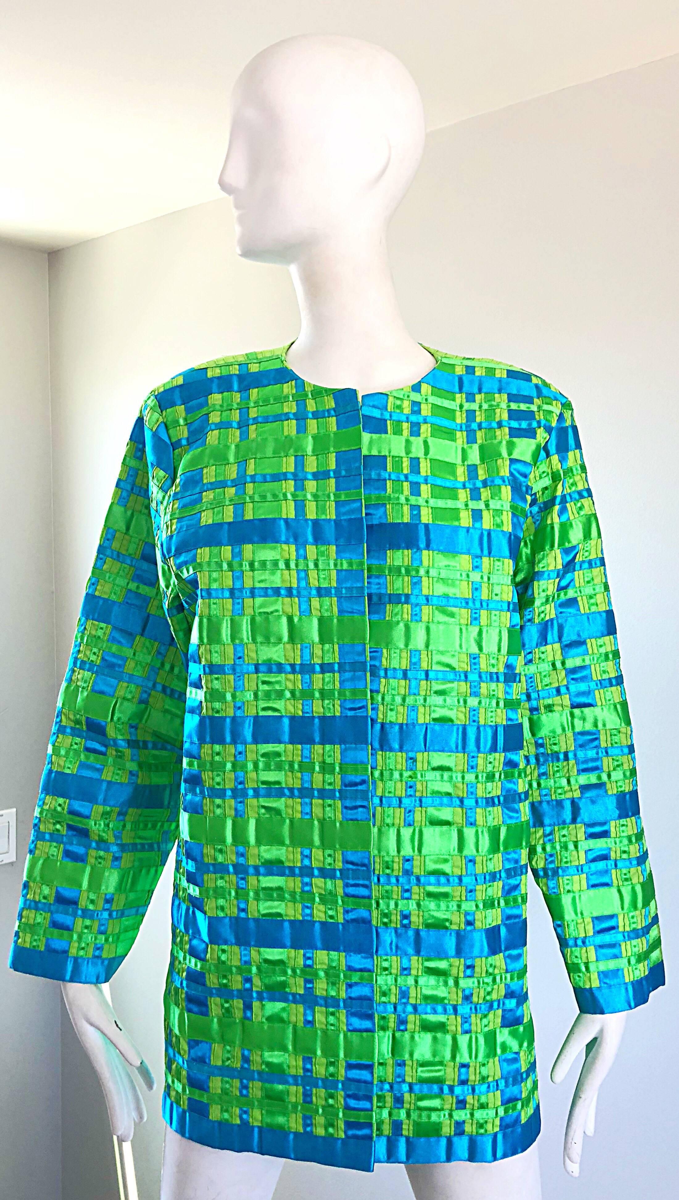 Fabulous vintage TACHI CASTILLO neon lime green and turquoise blue striped and plaid cotton Mexican ribbon jacket! Chic open front makes this rare gem perfect for layering. Perfect weight is great for all year wear. In great condition. 
Made in
