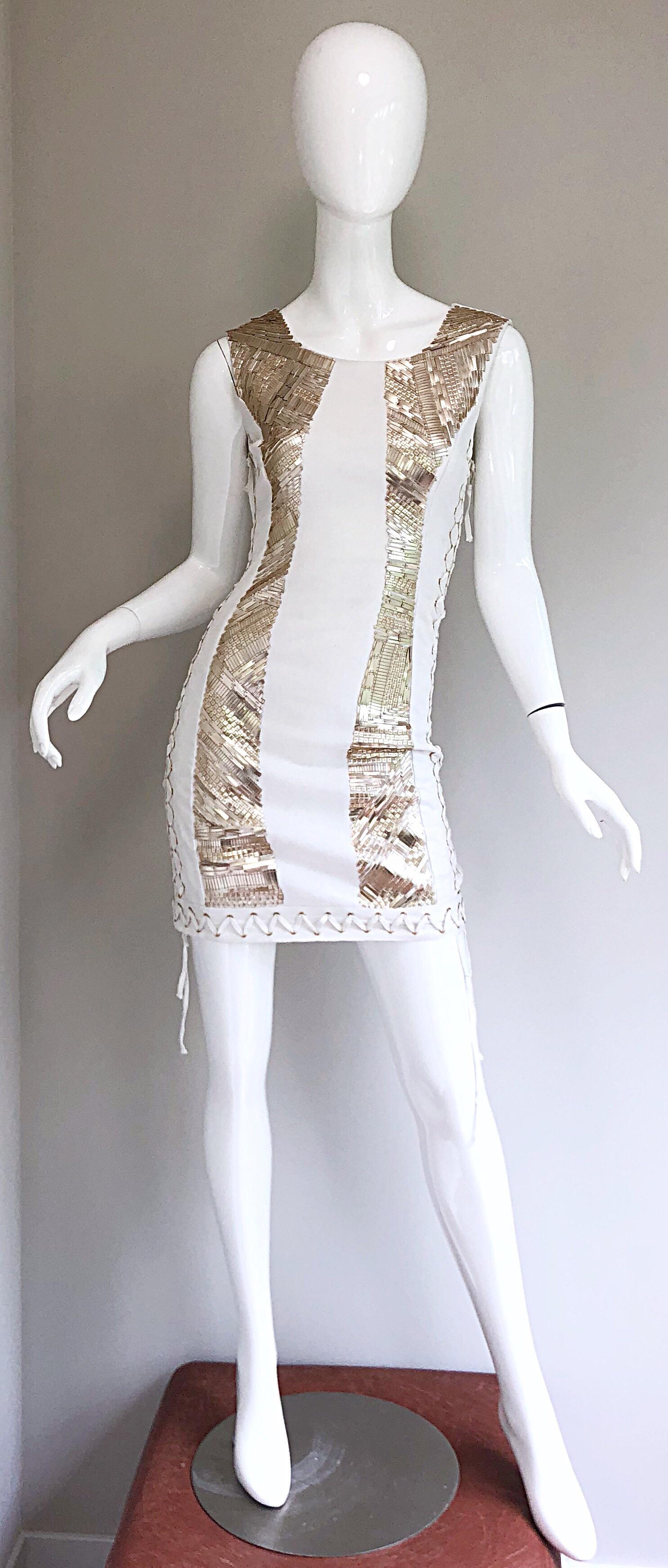 Sexy new with original store tags PIERRE BALMAIN white and gold sequined lace-up mini dress! Features thousands of muted gold rectangle sequin beads o each side of the front. Sturdy cotton (95%) and elastane (5%) fabric is flattering, comfortable,