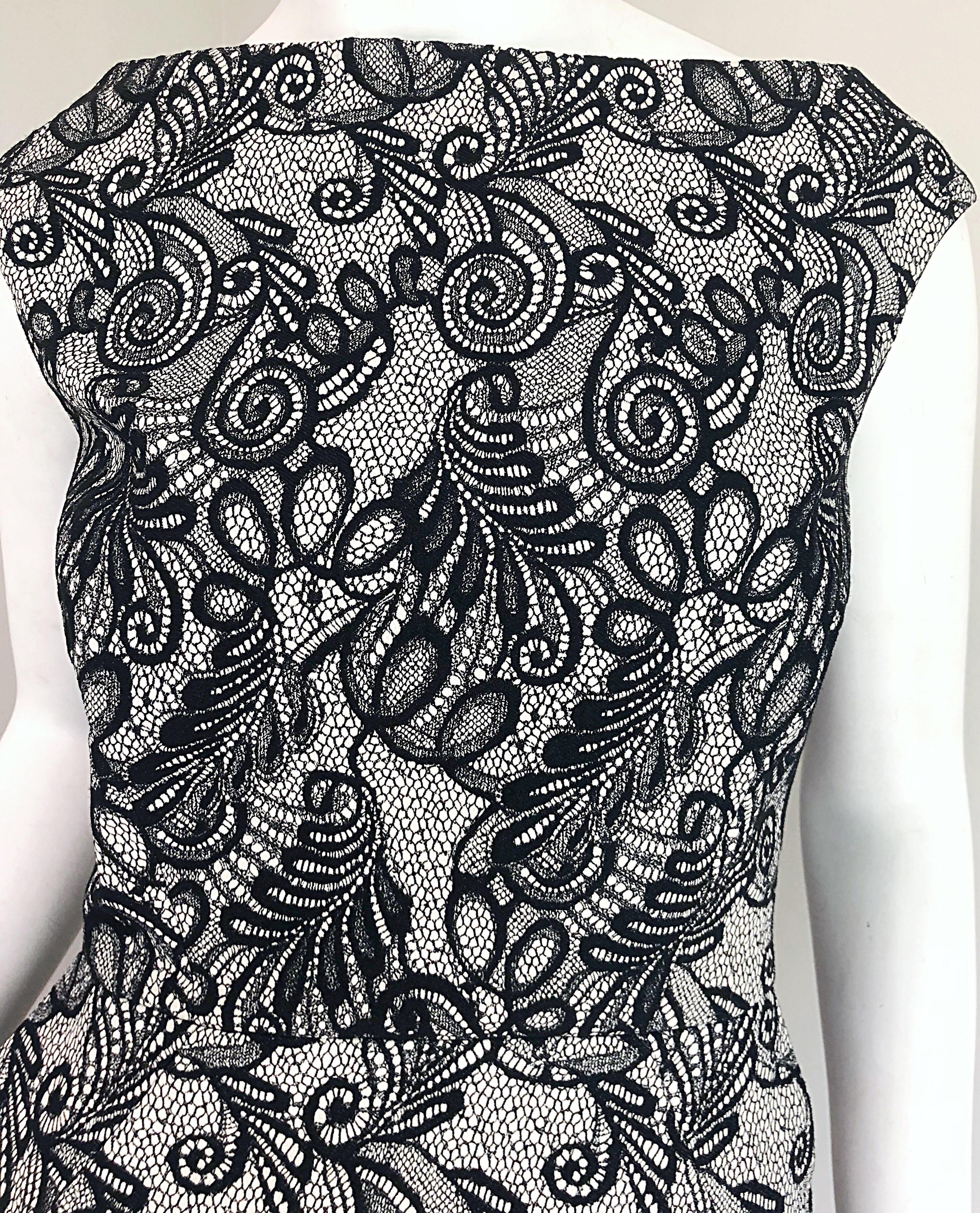 Elegant and rare early 2000s BILL BLASS by 
MICHAEL VOLLBRACHT black and white lace cocktail dress. 
This is an extra special piece, as Michael Vollbracht sadly passed away earlier last month. This is a prime example of his true talent!
Fitted