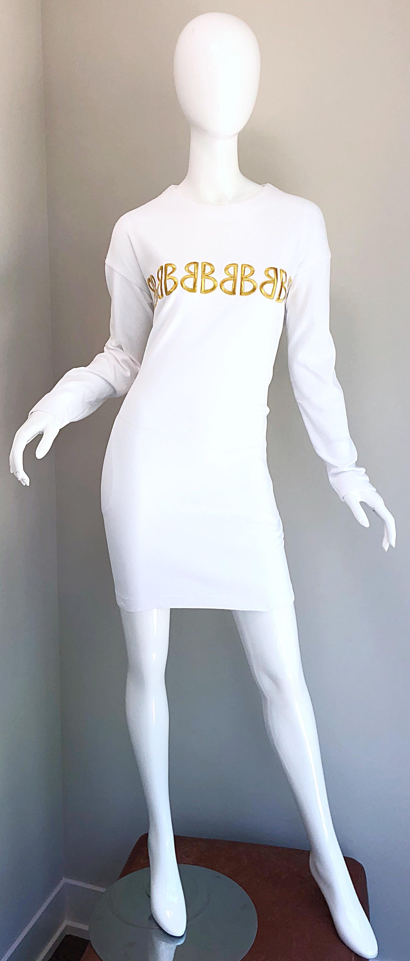 Awesome vintage 1990s BILL BLASS white and gold 'LOGO MANIA' embroidered cotton sweatshirt dress! Features the signature BB logo embroidered in gold above the bust. POCKETS at each side of the hip. Hidden zipper up the back with hook-and-eye