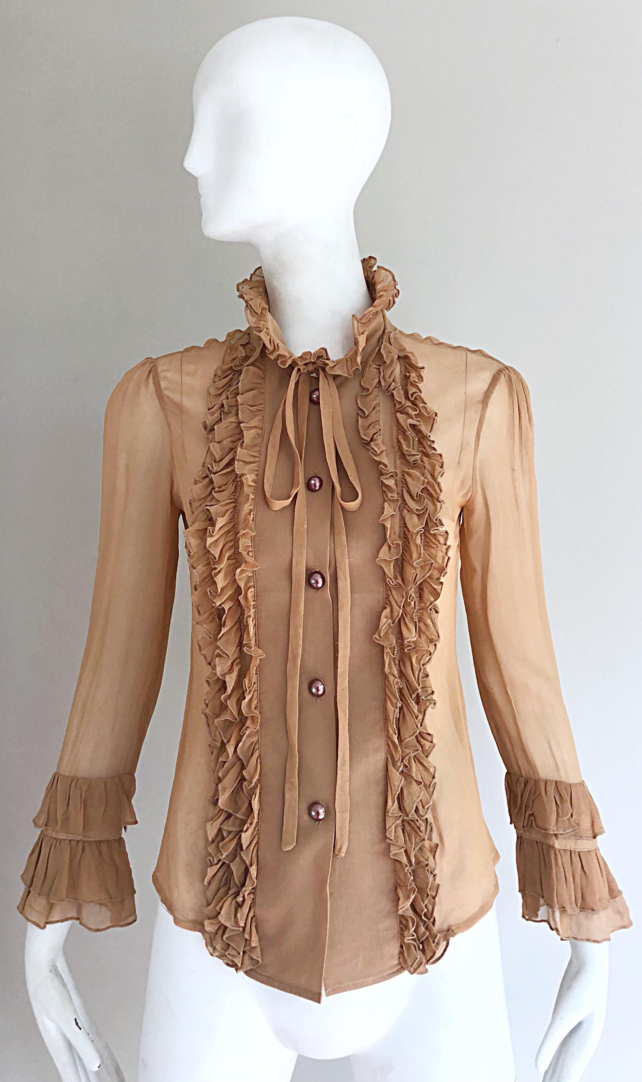 Extraordinary late 1990s CHLOE nude / tan silk chiffon sheer Victorian style shirt! Features ruffles down each side. Rhinestone encrusted buttons down the center bodice. Chic ties at each collar tie to a bo at center collar. A super versatile staple