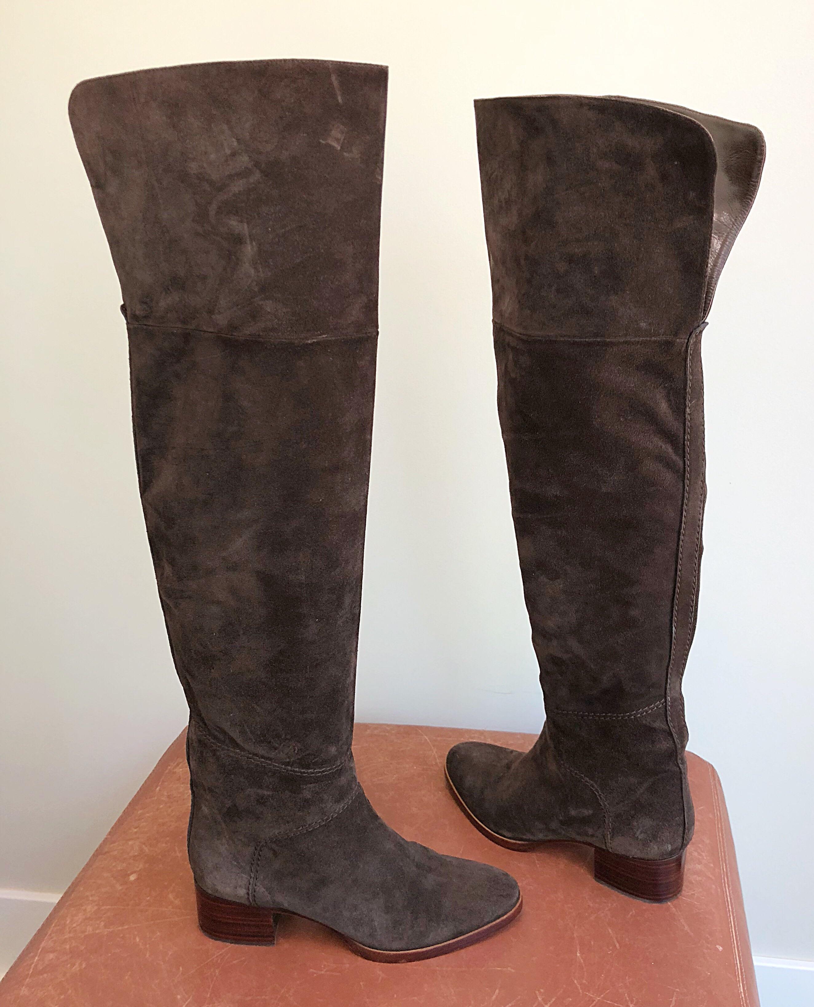 Brand new and impossible to find CHLOE brown suede over the knee riding boots! Beautiful rich bron color. Hidden zipper up the interior bottom. Leather lined at née for extra comfort, and can be folded over for a shorter look. The calves on these