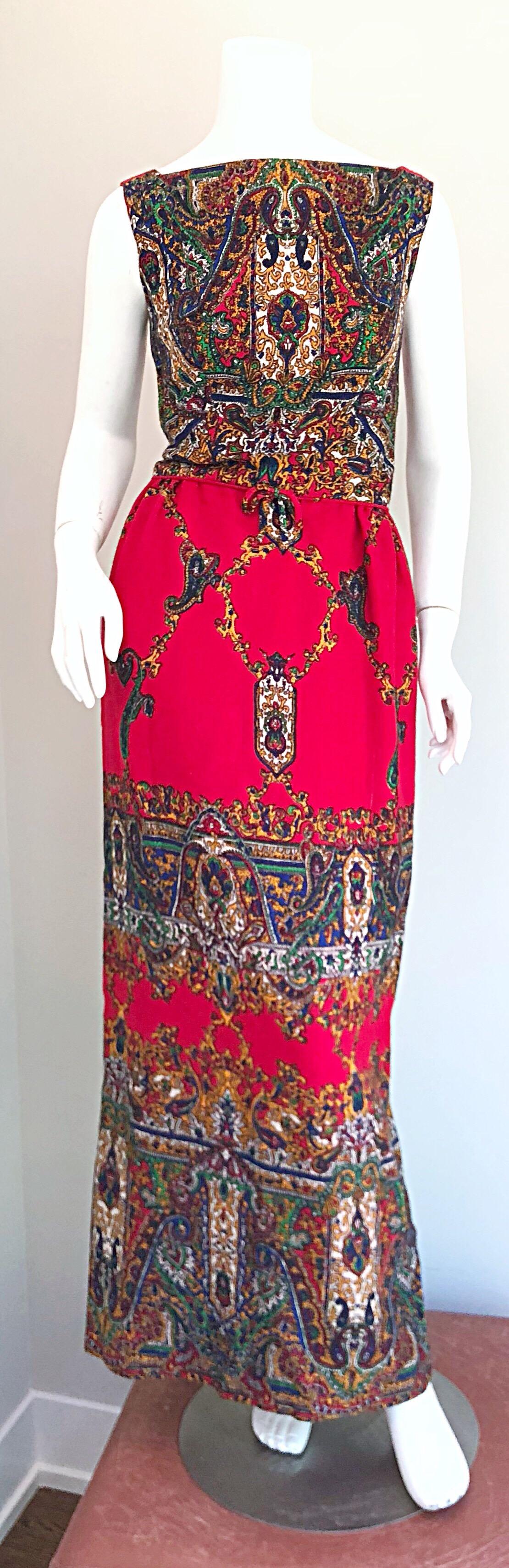 Fabulous early 1970s lightweight wool boho chic paisley print maxi dress! Features a red background with vibrant hues of blue, green, yellow and orange throughout. Open back reveals just the right amount of skin. Fully lined. Full metal zipper up