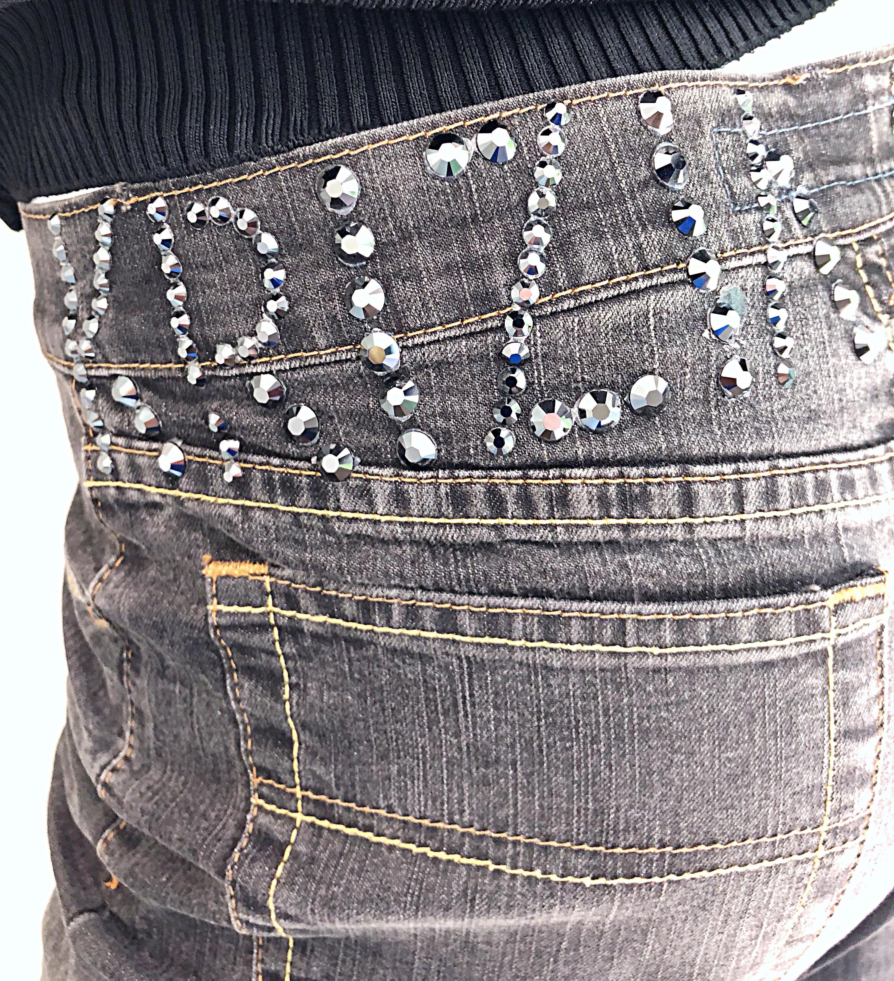 Awesome pair of late 90s KRIZIA gray rhinestone encrusted low-rise boot cut jeans! Features a slim fit and a flared leg opening. Soft cotton denim features some stretch. Pockets at each side of the waist, and two pockets on the rear. Button closure