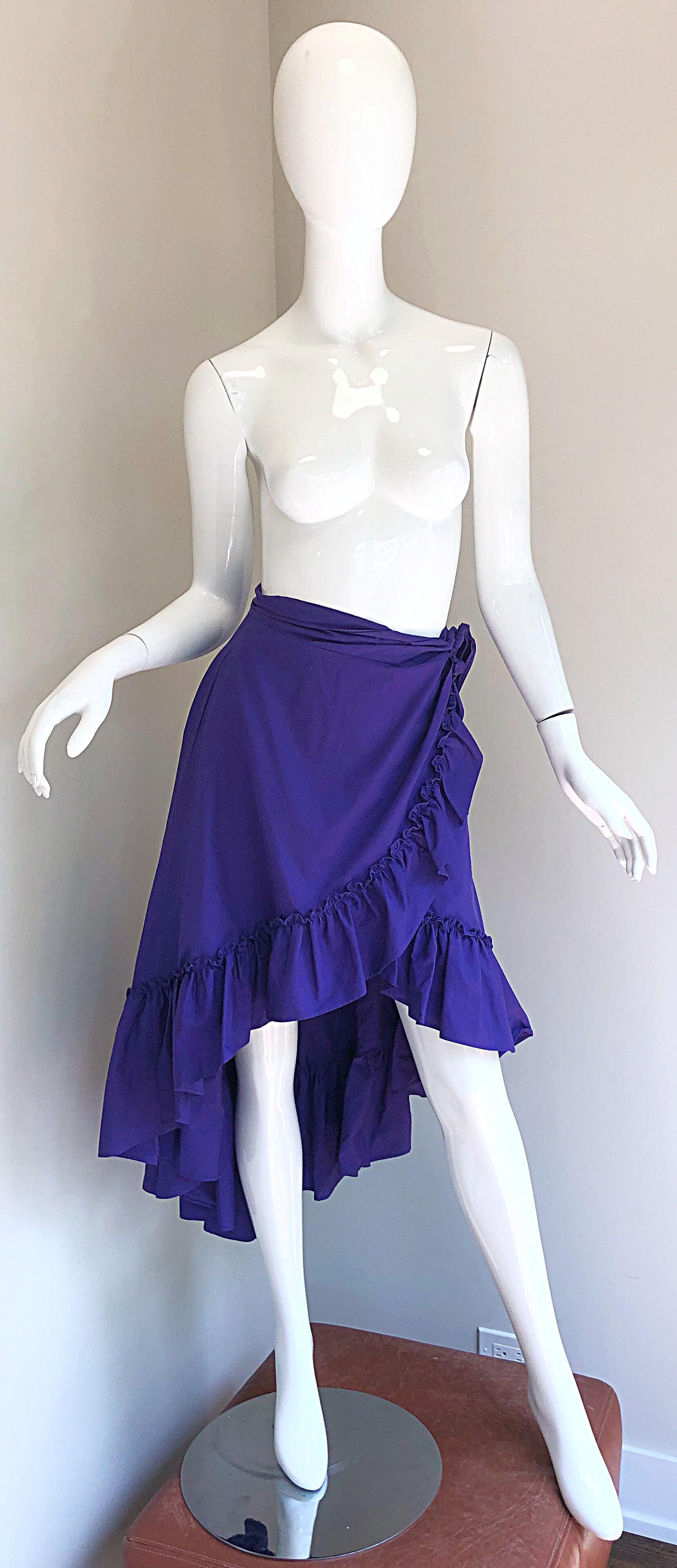 Incredible vintage 1980s EMMANUELLE KHANH purple cotton flamenco style wrap skirt! Features a ruffled hem that is shorter in the front and longer in the back. POCKET at right waist. Hidden button closure and ties at the left waist. Can easily be