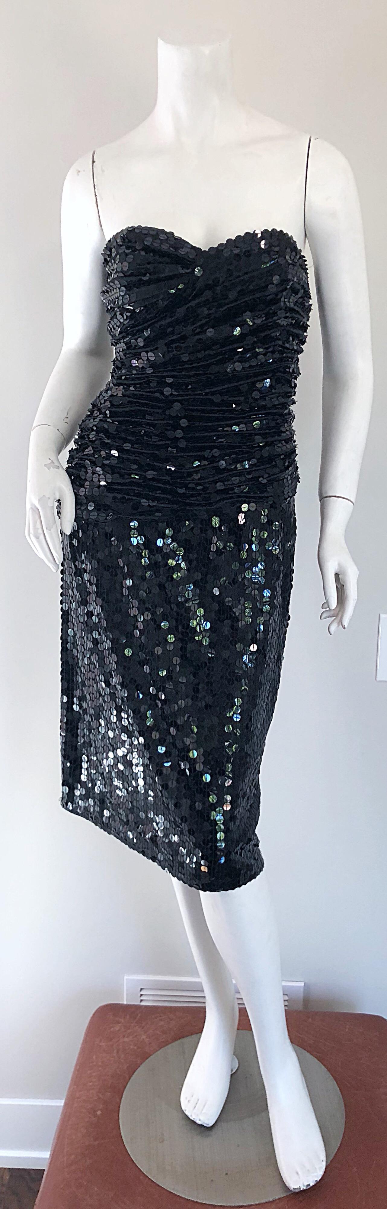 Stunning vintage late 80s VICKY TIEL COUTURE black silk strapless cocktail dress! Features thousands of hand-sewn black sequins throughout. Flattering ruched boned bodice offers plenty of stretch. Flirty skirt is perfect for dancing! Hidden zipper