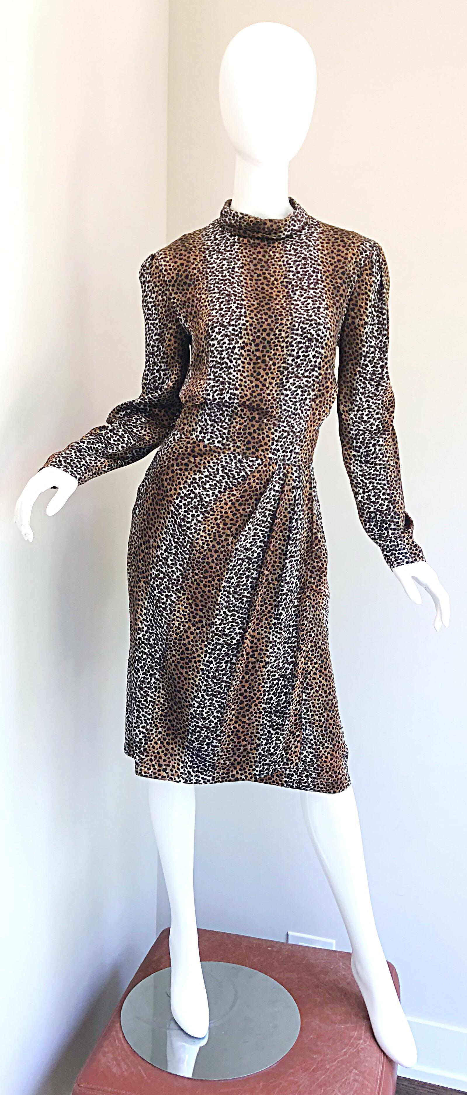 Flattering vintage LOUIS FERAUD leopard print ombre silk long sleeve dress! Features brown, tan, blac and white leopard / cheetah print throughout in a unique ombre. High neck and a tailored bodice. Gathers at the skirt are extremely flattering.