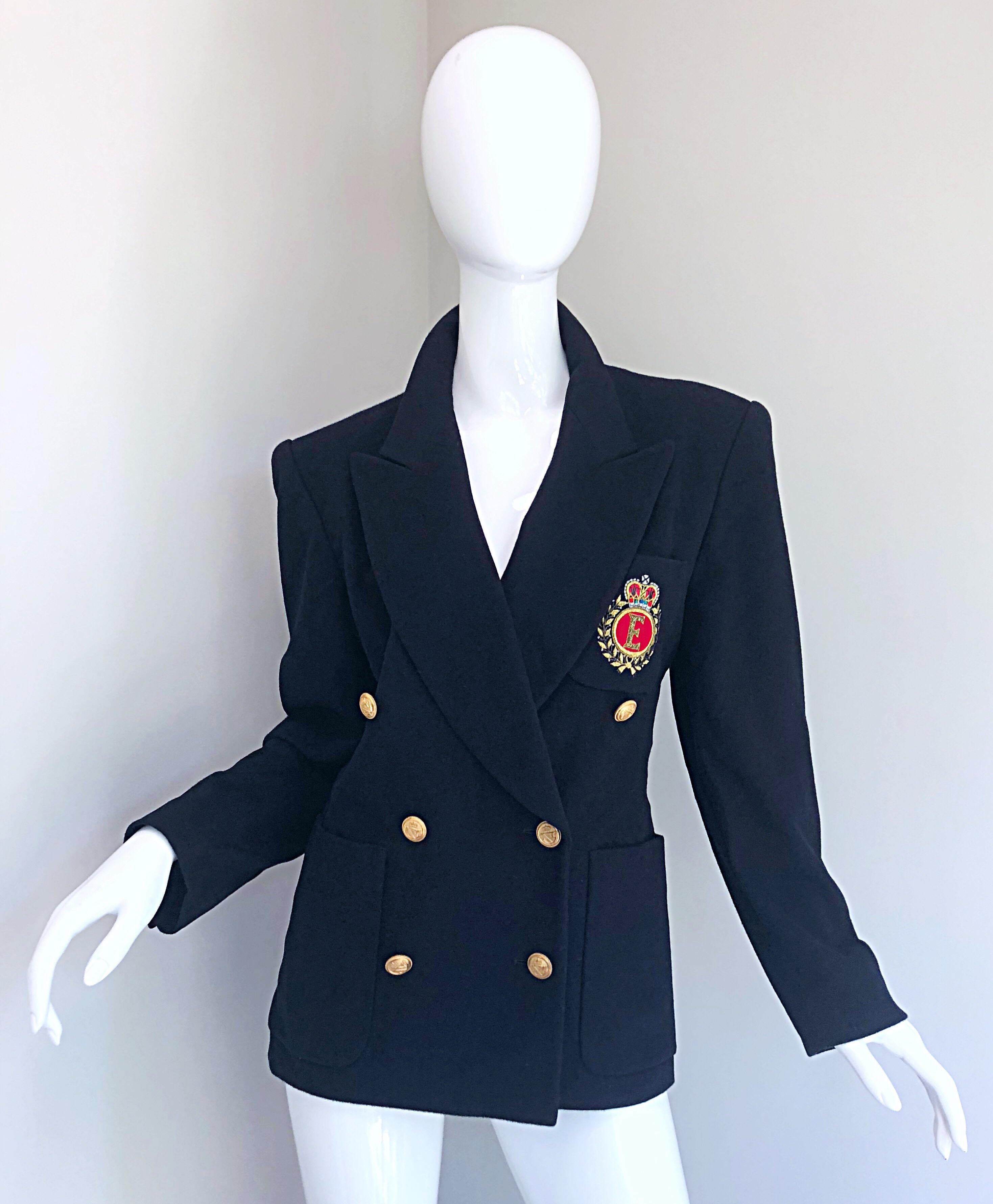 Chic vintage ESCADA by MARGARETHA LEY navy blue double breasted cashmere and wool 'crest' blazer jacket! Features a dark navy blue color with the signature Escada crest emblem embroidered in red and gold on the left breast. POCKETS at each side of