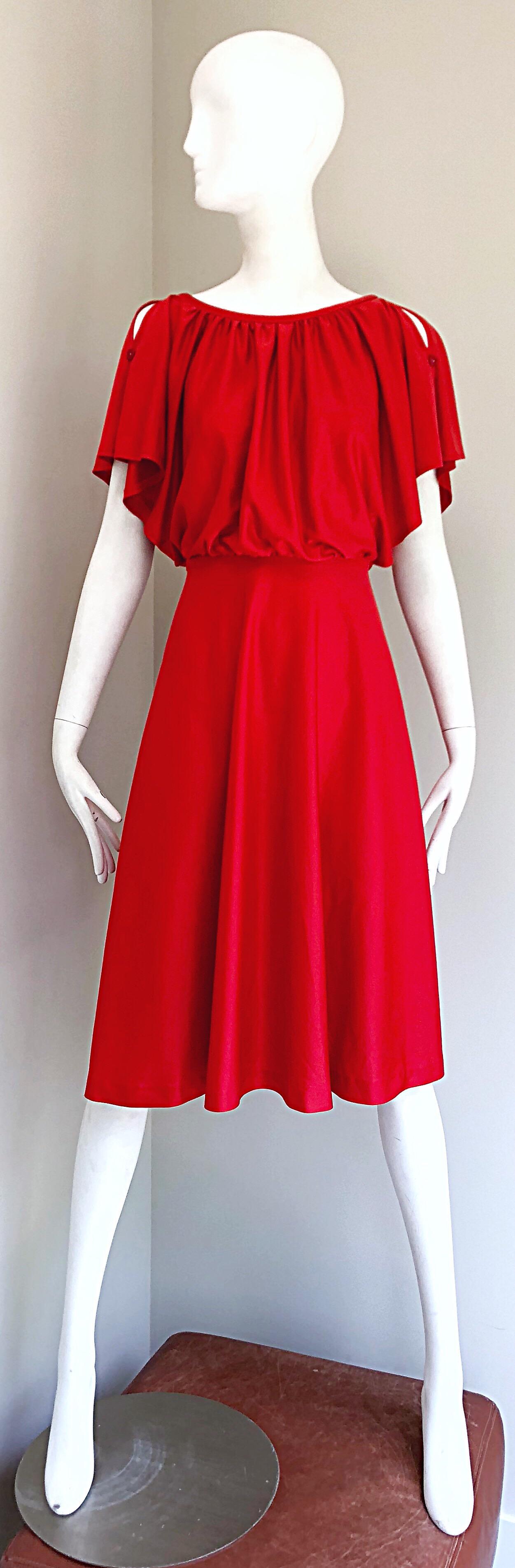 Chic 1970s coral / burnt orange cold shoulder boho dress! Slinky fit with a slouchy bodice and flattering flirty skirt. Cold shoulders feature cut-outs at each shoulder with a mock button. Hidden zipper up the back with hook-and-eye closure. Can