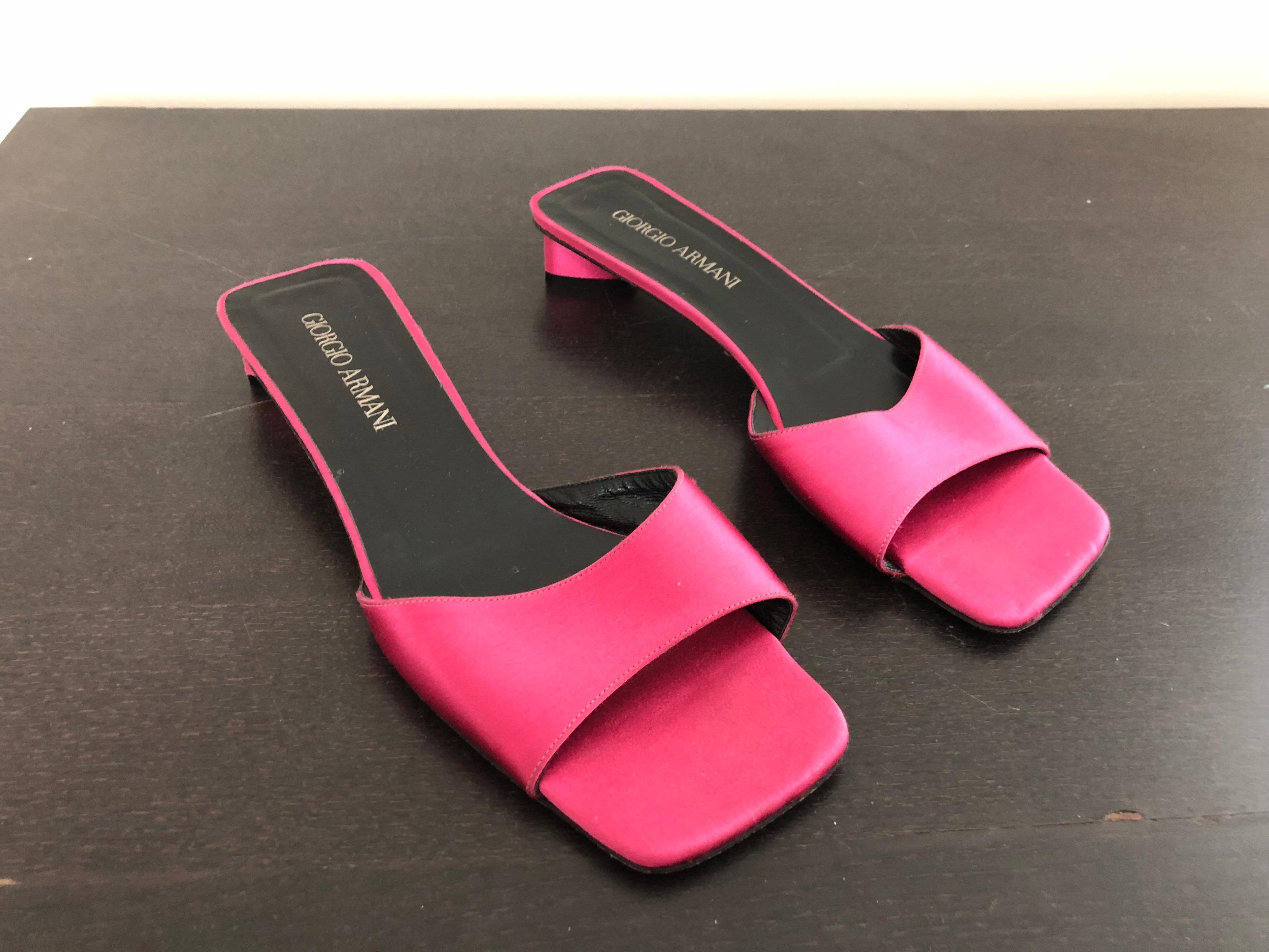 Sensible without sacrificing style! These vintage GIORGIO ARMANI hot pink silk satin kitten heel sandals are so chic! Vibrant pink color with a low heel. Never been worn. Great with jeans, a skirt, shorts or a dress. In great condition. Made in