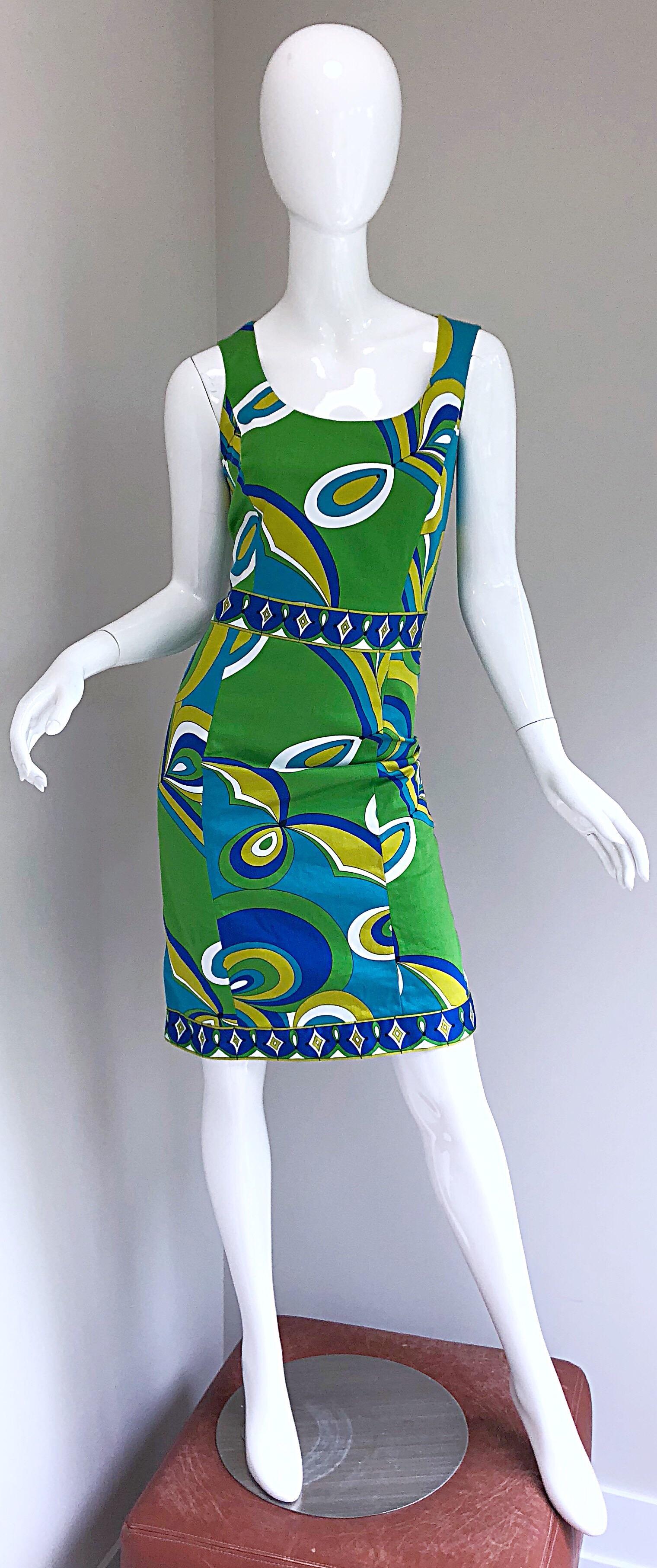 Chic 90s does 60s HARVE BENARD vintage mod sheath dress! Features an Emilio Pucci styled kaleidoscope print in vibrant colors of green, chartreuse, turquoise blue, royal blue and white throughout. Stretch Cotton (97%) and Spandex (3%) is both