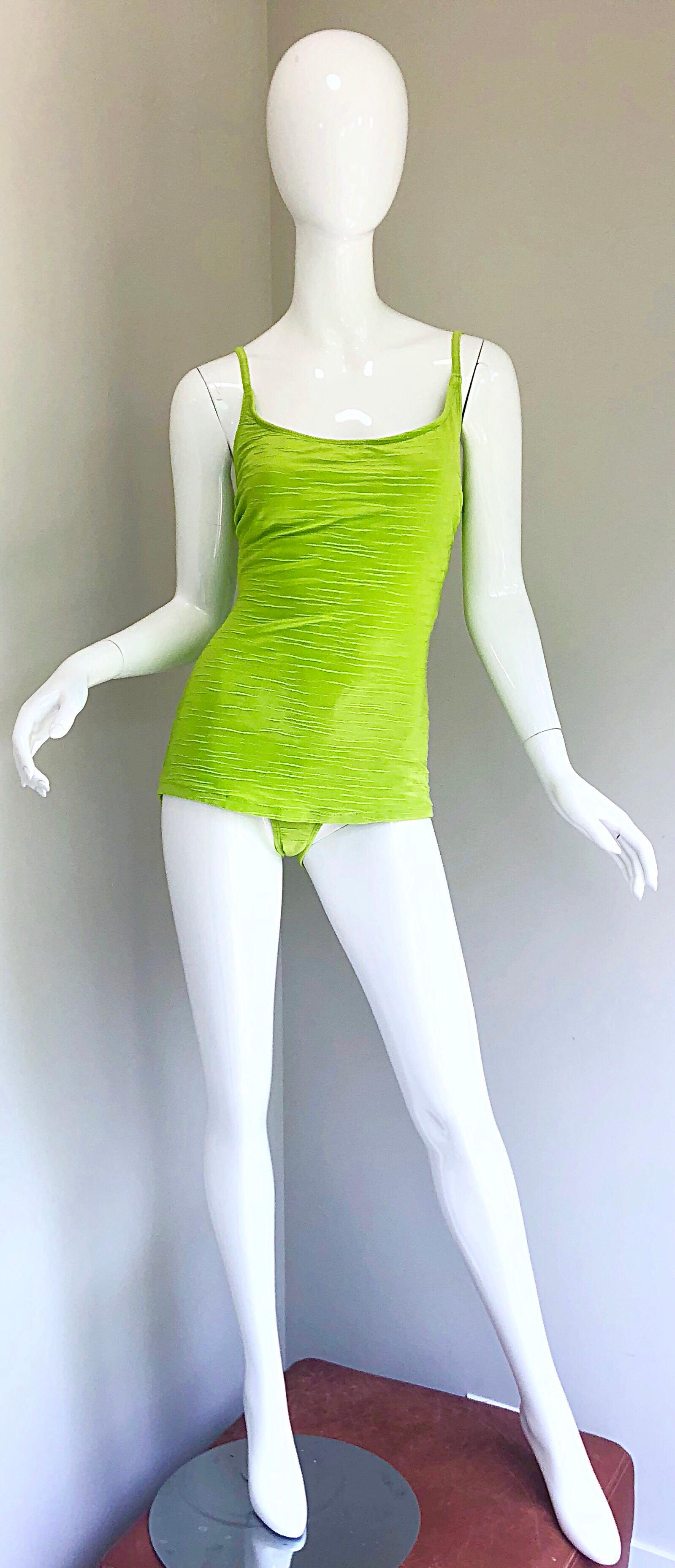 Chic early 2000s does 1960s OSCAR DE LA RENTA neon lime green one piece Size 14 swimsuit or bodysuit! Features a flattering boy cut front that hides any problem areas. Straps can be switched to a racerback for added support. A great pop of color
