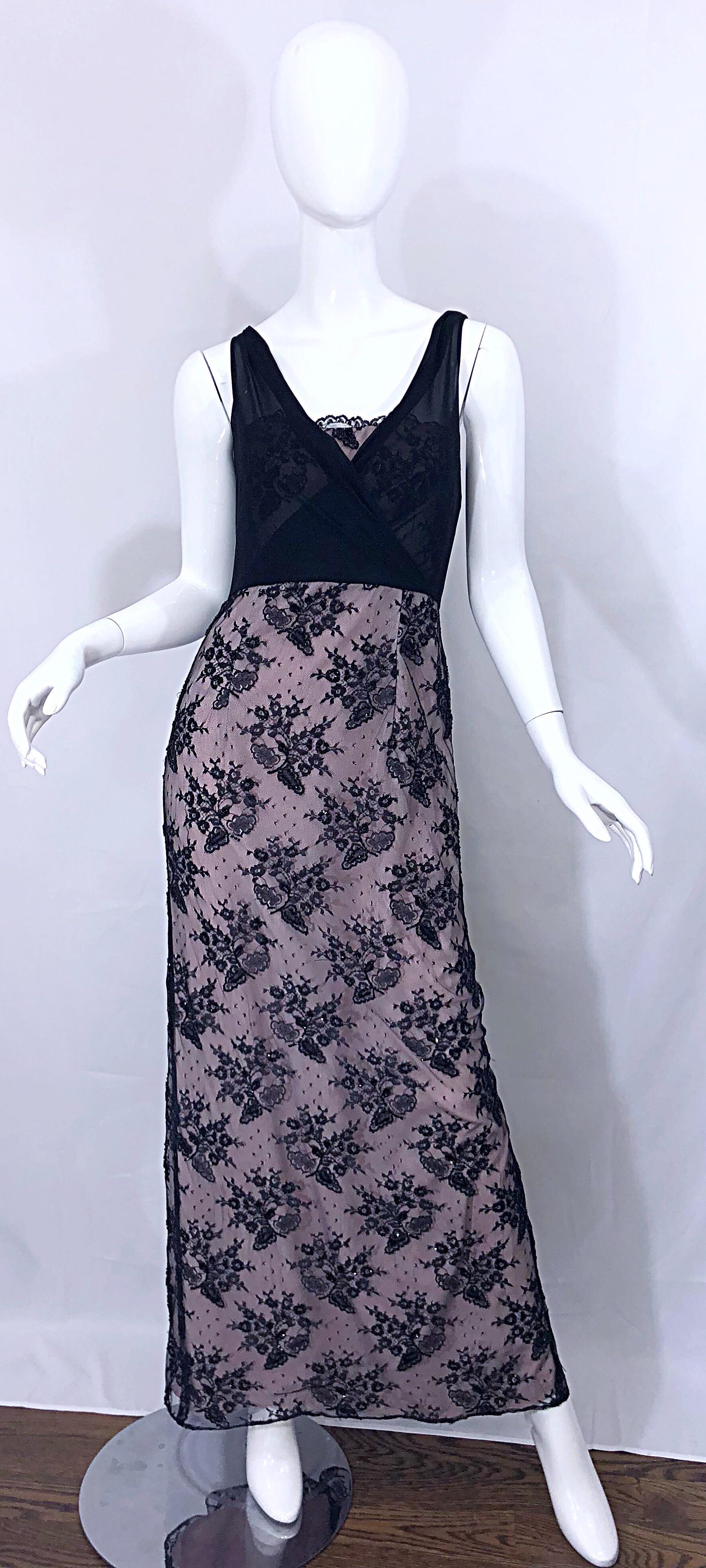 Gorgeous vintage BOB MACKIE black and pink beaded French lace evening gown! Features a light pink taffeta underlay. Black French lace covers the pink, and a semi sheer black chiffon bodice. Hidden zipper up the back with hook-and-eye closure.