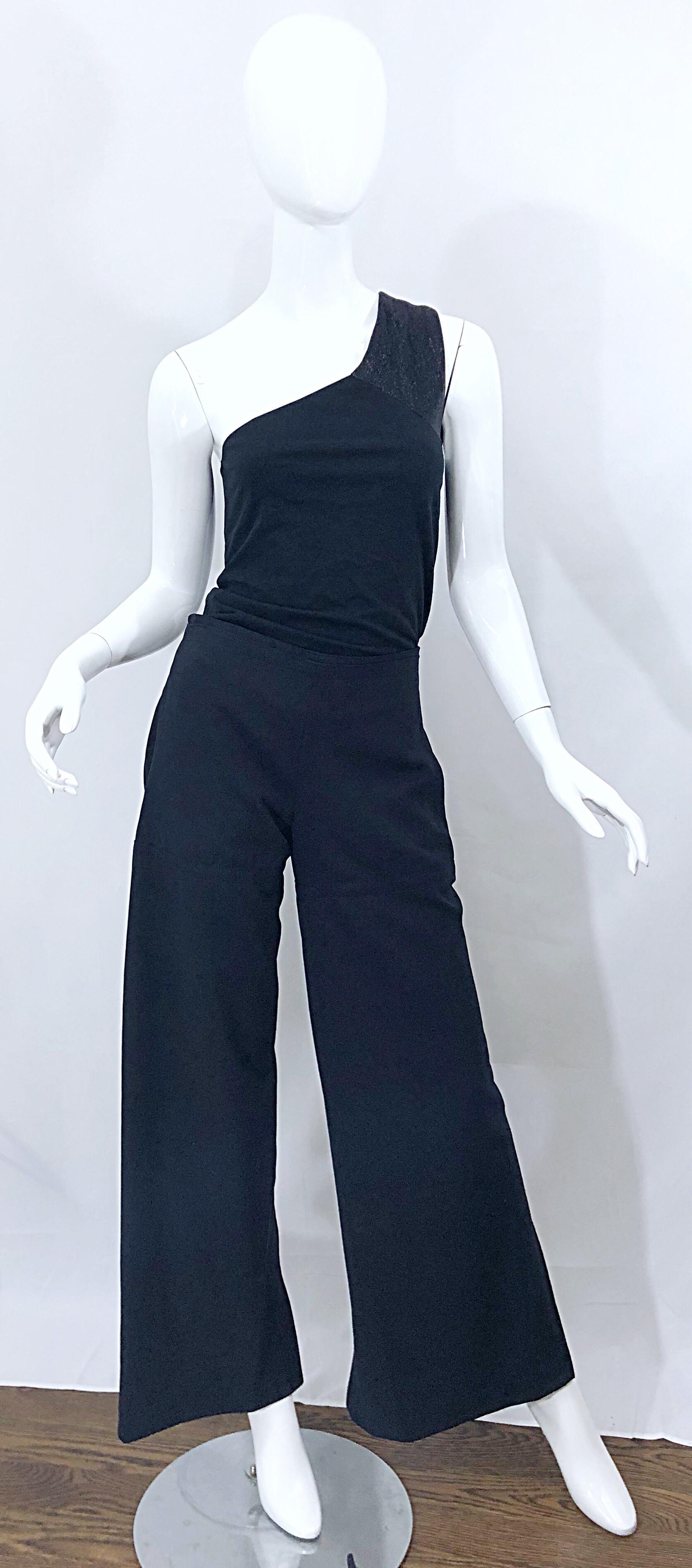 Rare Y2K DIRK BIKKEMBERGS black wool blend zip-up high waisted pants! Features an Avant Garde flattering fit. Velcro straps at each side of the back waist can adjust to fit an array of sizes. Pockets at each side of the hips. Can easily be dressed
