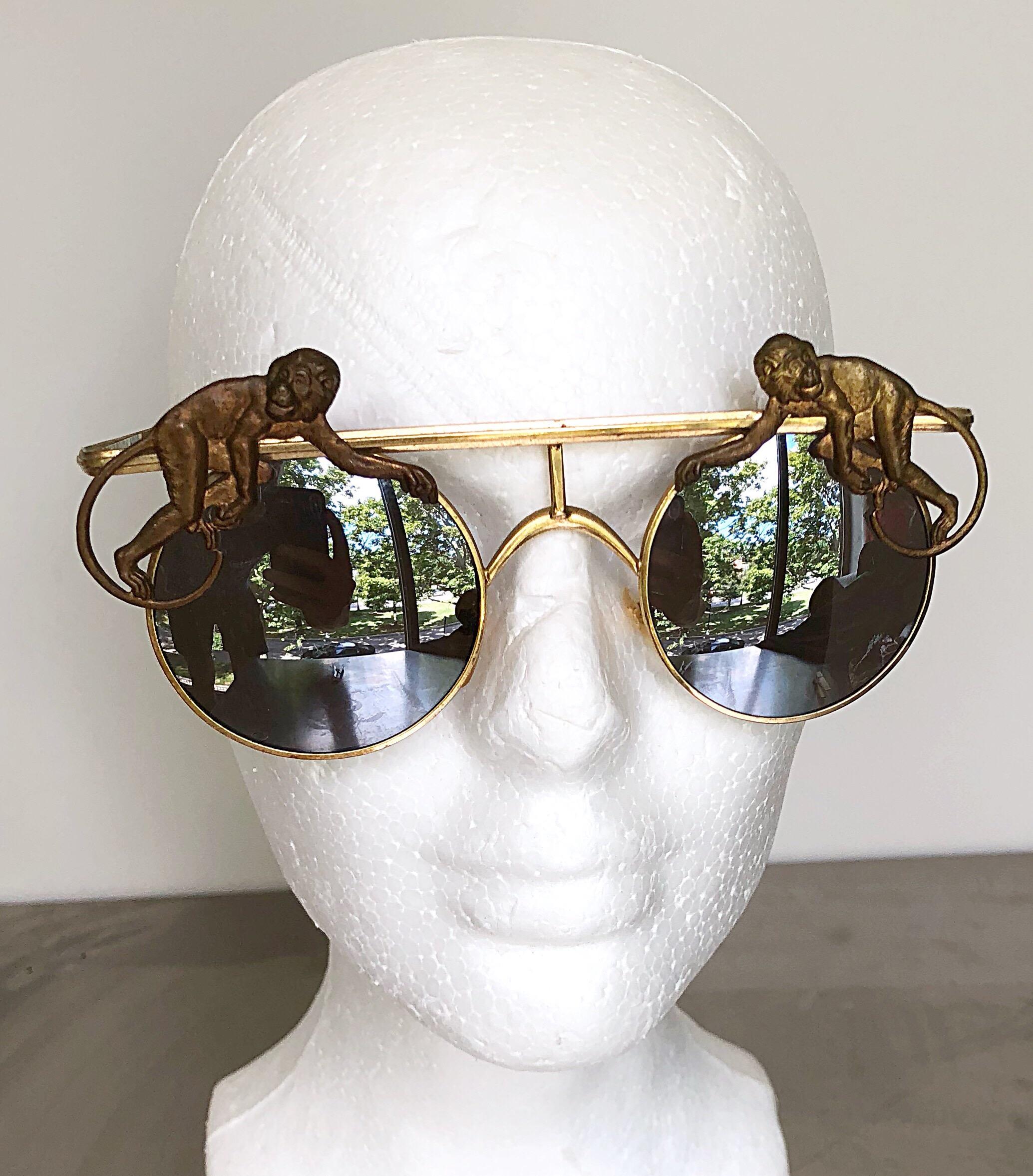 I have had these rare vintage MERCURA unisex sunglasses once before, and they sold instantly! Imagine my excitement when I found them again! Features gold rims with a brass monkey at each temple. Make a statement while protecting your eyes! In great
