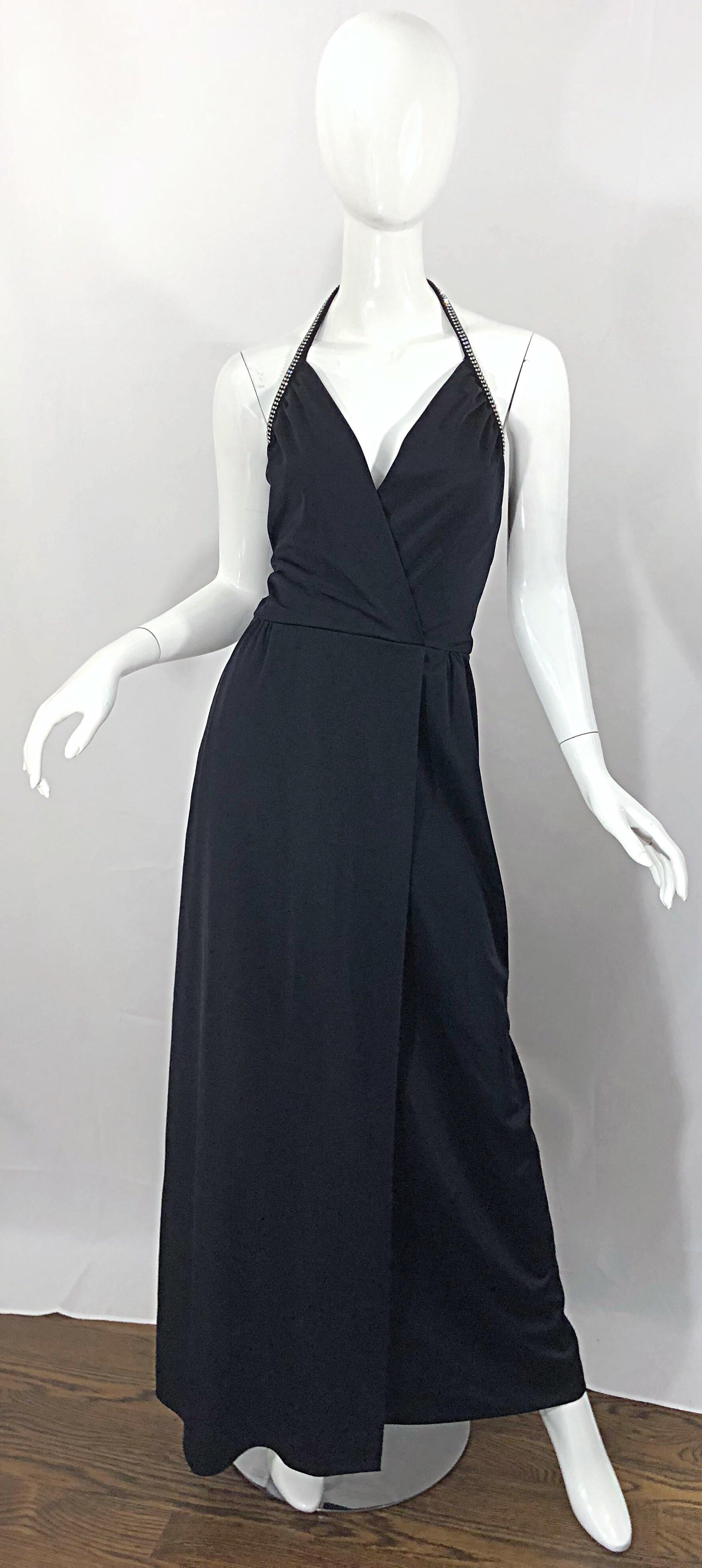 Sexy, yet classic 1970s LILLI DIAMOND black jersey rhinestone encrusted faux wrap jersey plunging Grecian halter gown / maxi dress! Features a fitted crossover bodice with a flattering and forgiving full skirt. Wonderful soft jersey fabric stretches