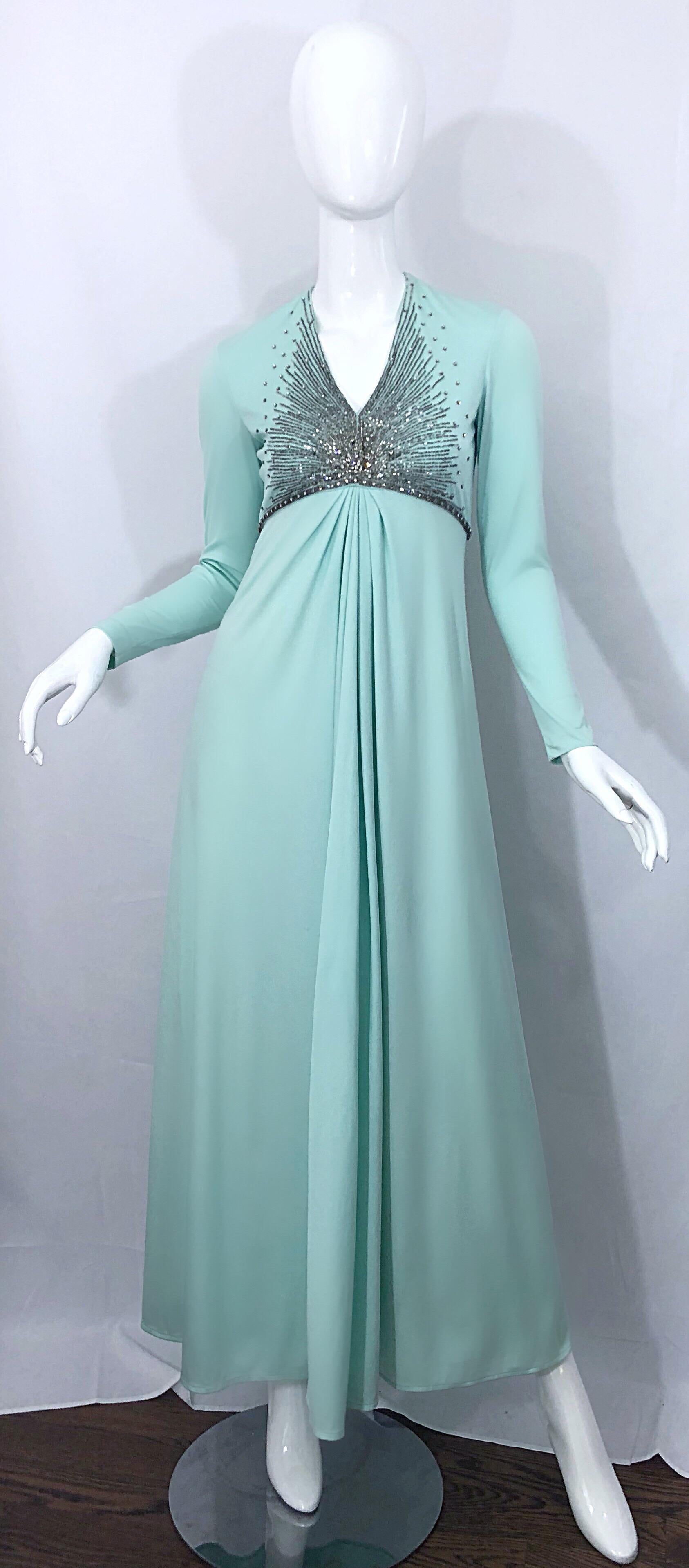 Gorgeous vintage early 1970s VICTORIA ROYAL Couture light mint blue / green rhinestone beaded jersey gown! Features a beautiful mint blue color that is perfect for any skin tone. Soft double-ply jersey stretches to fit. Tailored v-neck bodice has