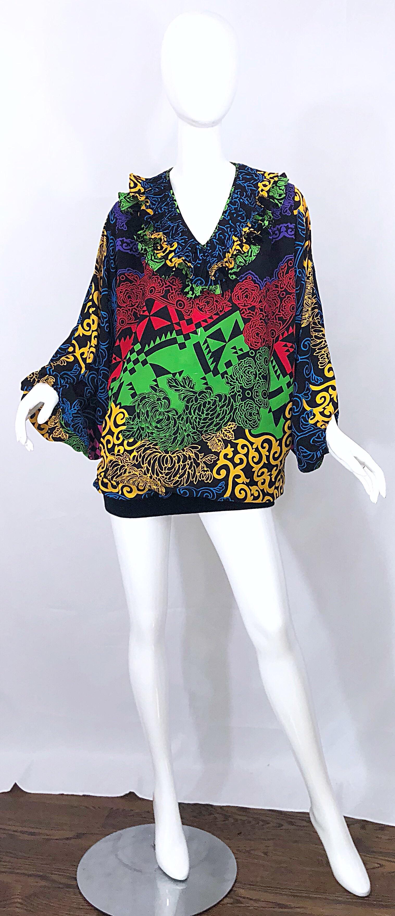 Amazing 1980s Diane Freis  neon abstract geometric print tunic or mini dress! Features signature Diane Freis slouchy fit, with a fitted stretch hem. Ruffled collar along the neck. Free dolman sleeves will fit an array of sizes. Vibrant colors of