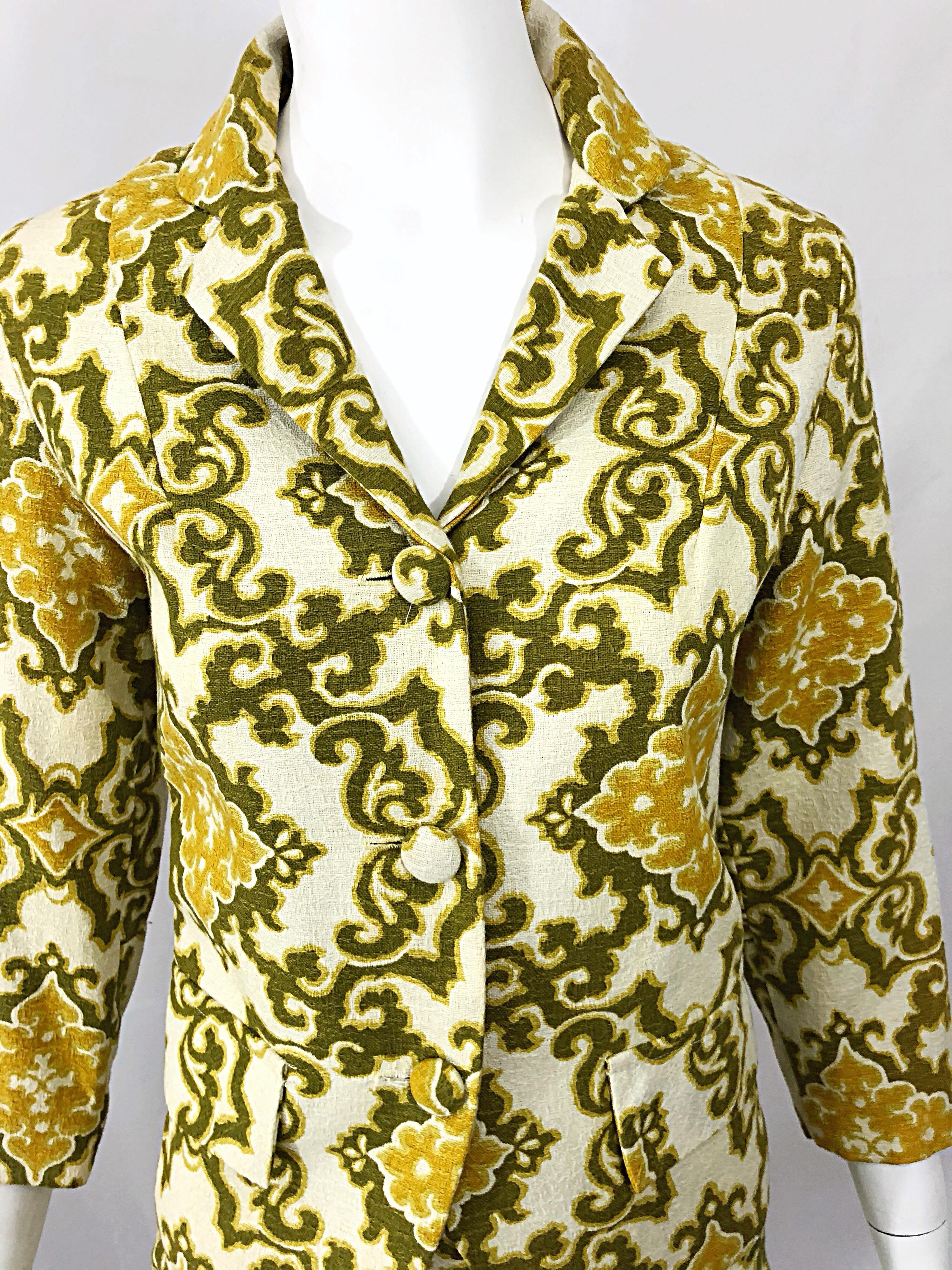 Chic vintage 1960s JOSEPH MAGNIN baroque print silk and cotton blend two piece skirt suit! Features baroque print throughout in vibrant warm tones of chartreuse green, yellow and ivory. Jacket has three buttons up the front. High waisted pencil