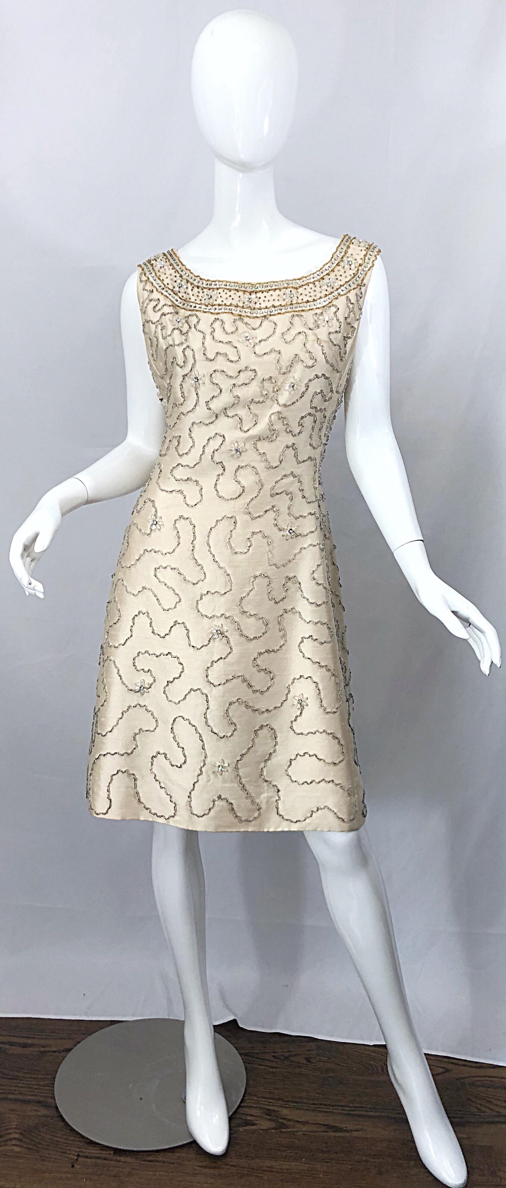 Gorgeous vintage 60s JEAN LUTECE Couture, by Roy Gaynor British Hong Kong ivory silk shantung two piece A-Line dress and swing jacket ensemble! Features wonderful silk shantung fabric. Thousands of hand-sewn beads, sequins, rhinestones, and crystals