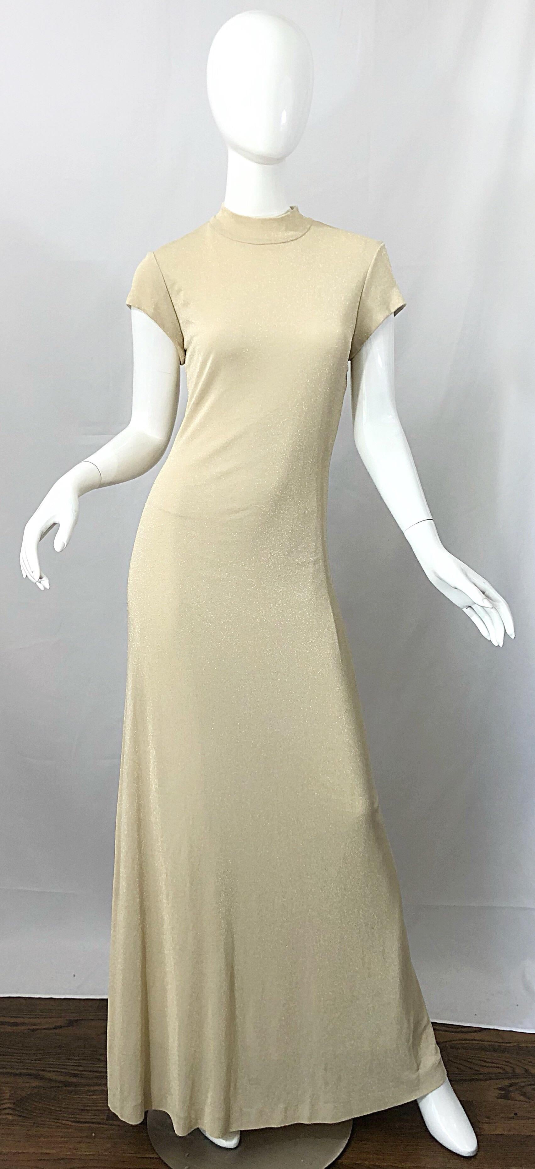 Beautiful vintage 90s HUEY WALTZER light pale gold high neck evening dress! Features a soft metallic jersey that stretches to fit. Lovely metallic light gold fabric gives off just the right amount of sheen, and is not flashy. Hidden zipper up the