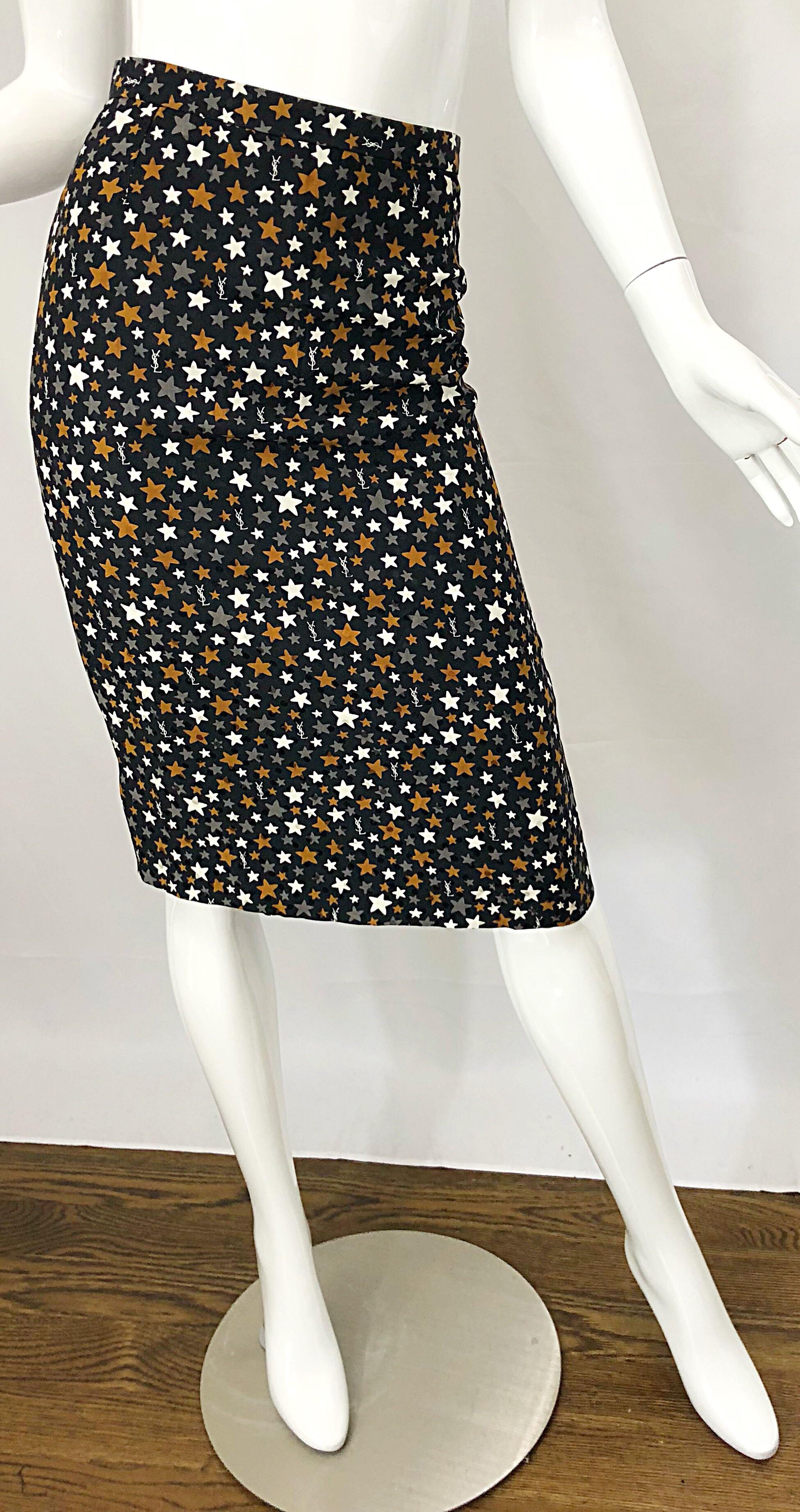 1990s YVES SAINT LAURENT ' logo and stars' high waisted silk pencil skit! Features a black silk background, with brown, gray and white YSL logo and stars printed throughout. Fantastic flattering fit with an exciting stylish print. Hidden zipper up