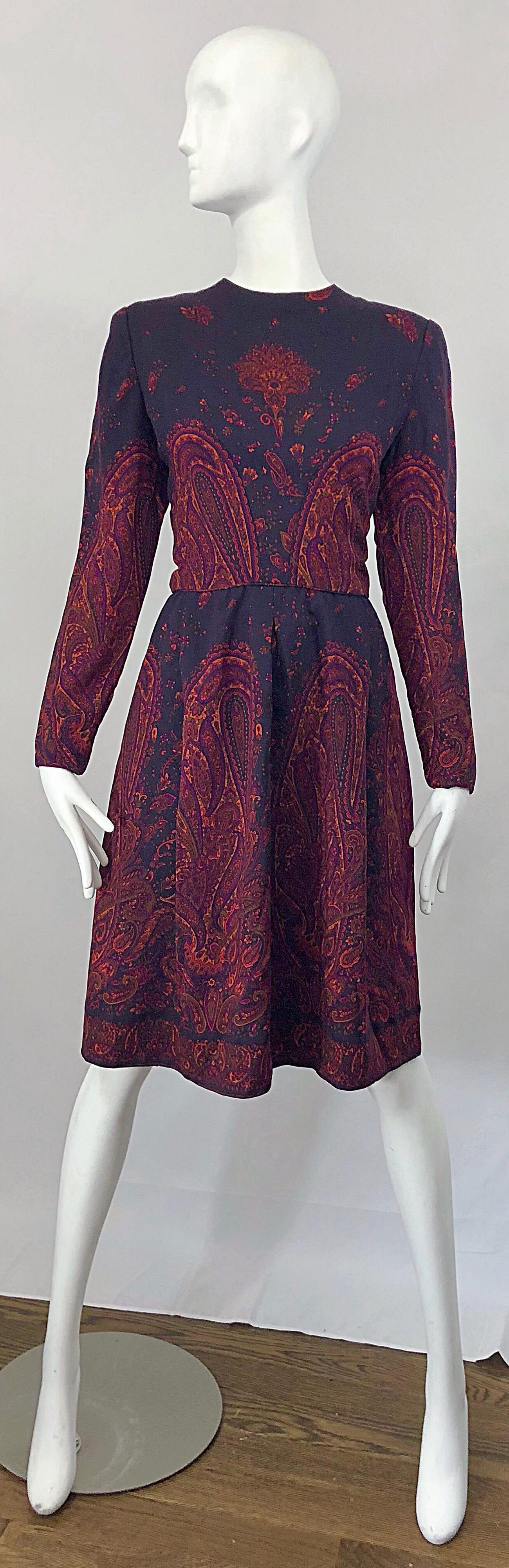 Chic late 1970s / 70s PAULINE TRIGERE dark purple lightweight wool challis long sleeve dress! Features flattering symmetrical paisley prints in burnt orange, purple and red strategically placed throughout. Couture quality, with the majority of the