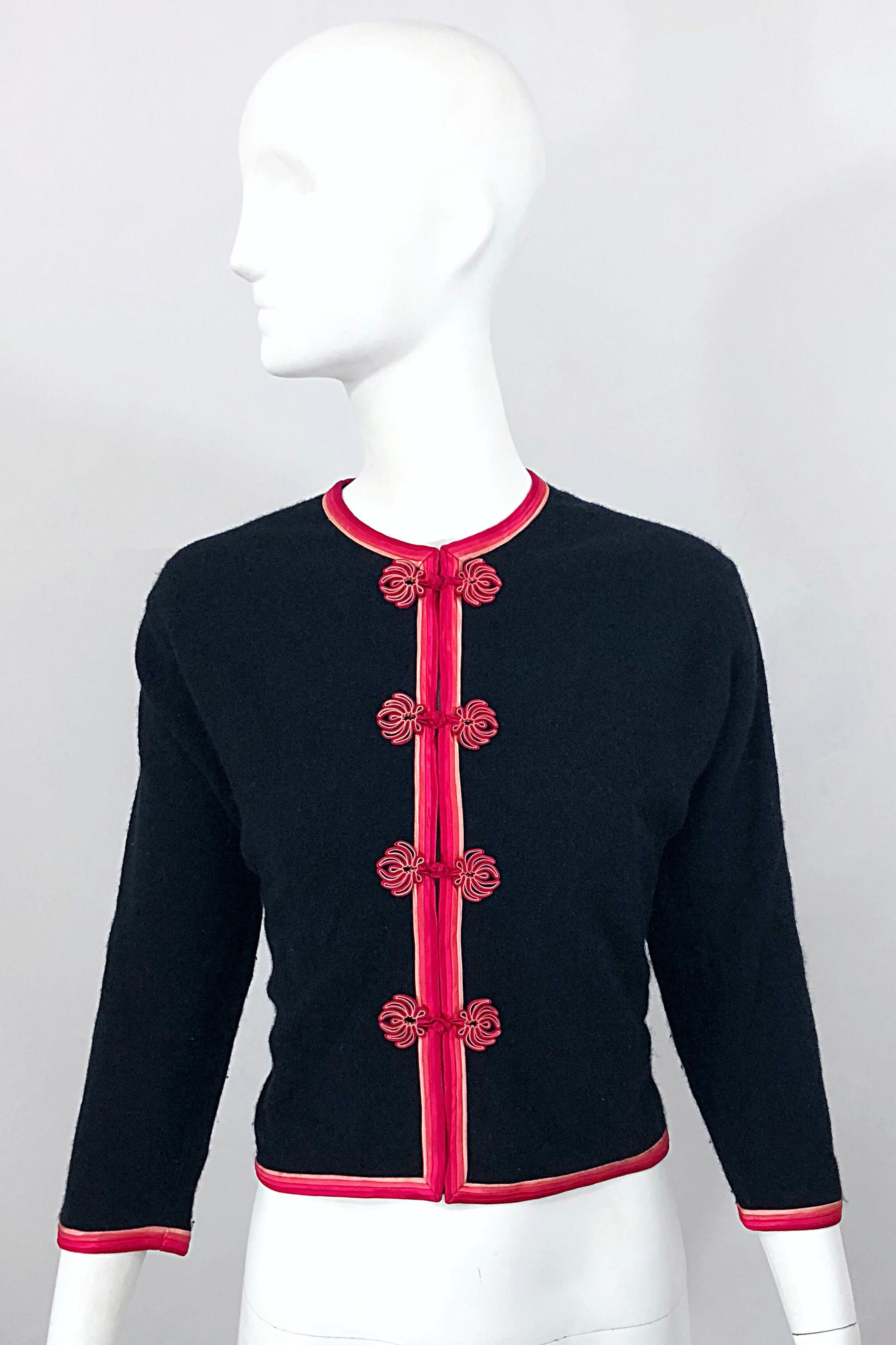 Chic stylish mid century 1950s MONHAN'S LTD. Asian black and pink soft wool cropped cardigan! Features the softest virgin wool that is fully lined. Pink and fuchsia silk ribbon detail up the center, at each sleeve cuff, around the neck, and at each