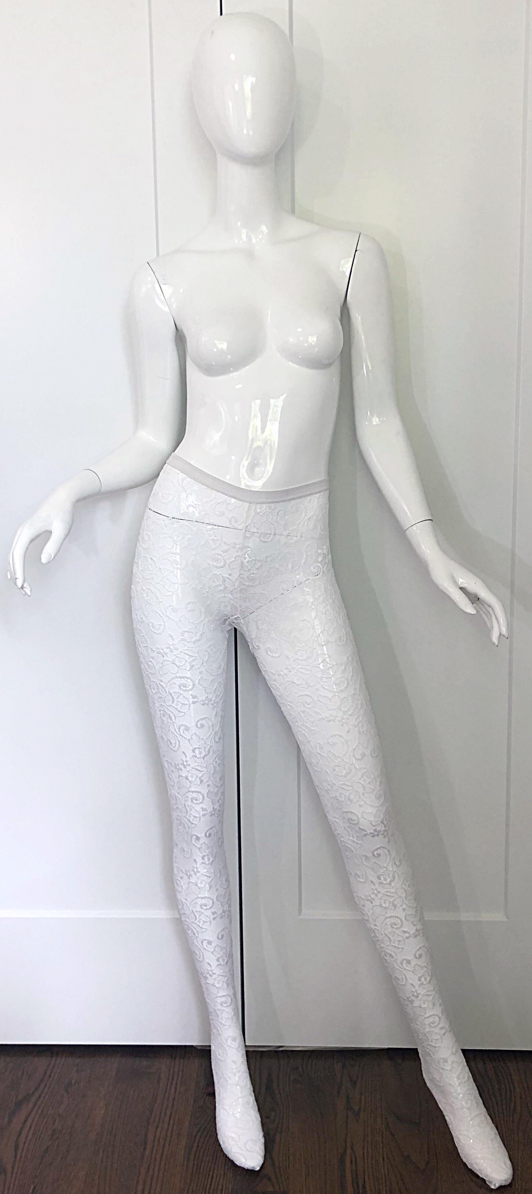 Brand new never worn early 1990s GIANNI VERSACE stark white lace pantyhose / leggings / stockings! A definite statement maker that would look great with a dress, skirt, or even shorts. In great unworn condition. Made in Italy
Marked Size 40 / US 6,