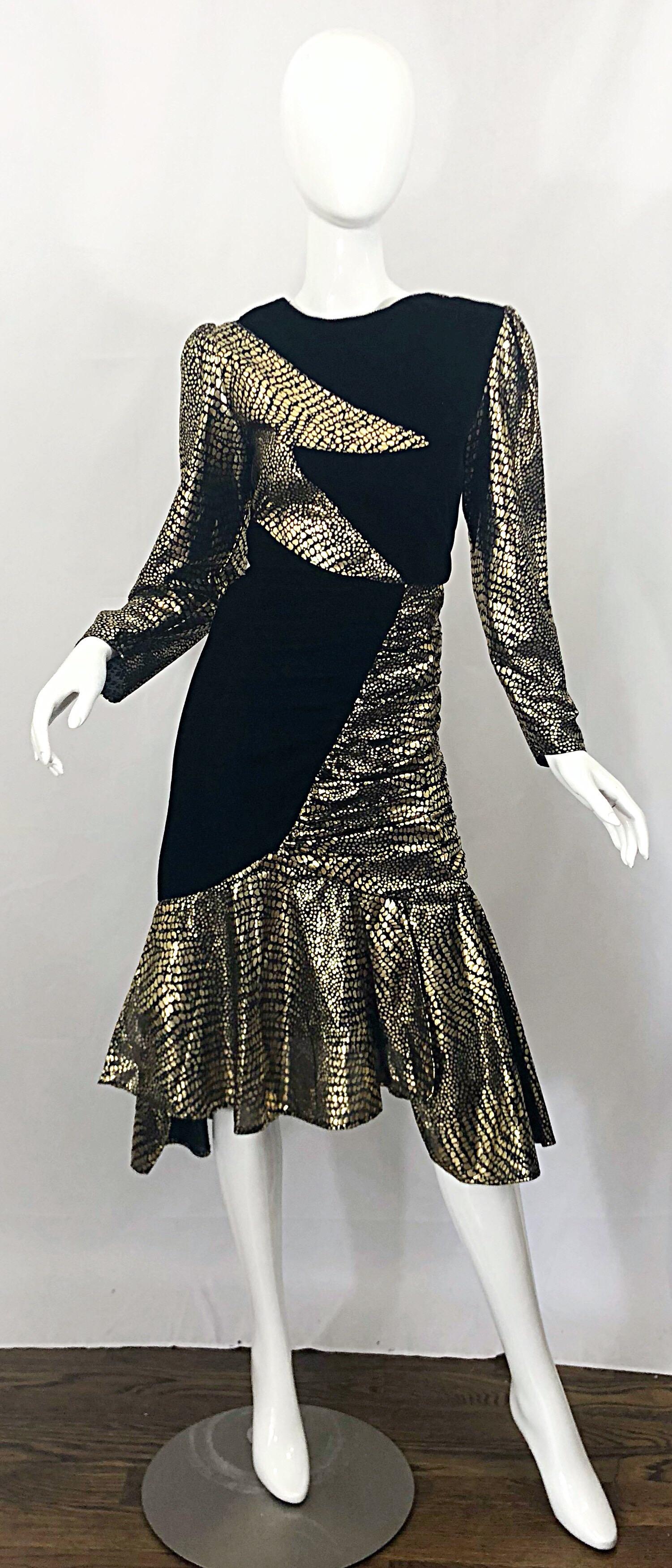 Fabulous 1980s gold and black Avant Garde long sleeve vintage dress! Features soft cotton velvet and a printed alligator gold metallic lame. Looks like a lightning bolt! Gold lame back. Fitted body with a flared Flamenco style hem. Hidden zipperup