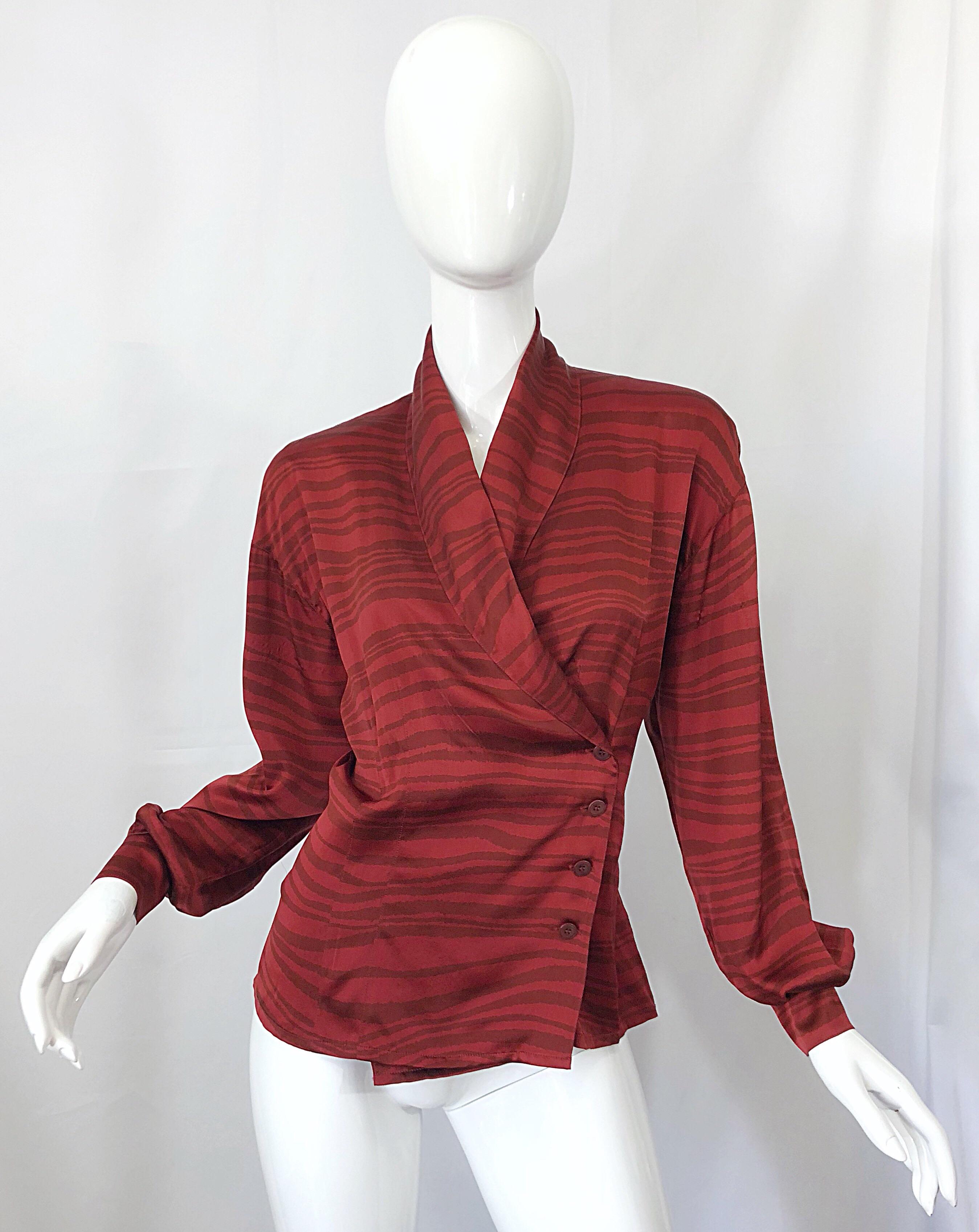 Chic vintage 90s does 40s ESCADA by MARGARETHA LEY warm red / rust and light brown zebra print silk wrap blouse! Double breasted style is stylish and flattering. Shoulder pads add just the right amount of shape, but can easily be removed. Buttons at