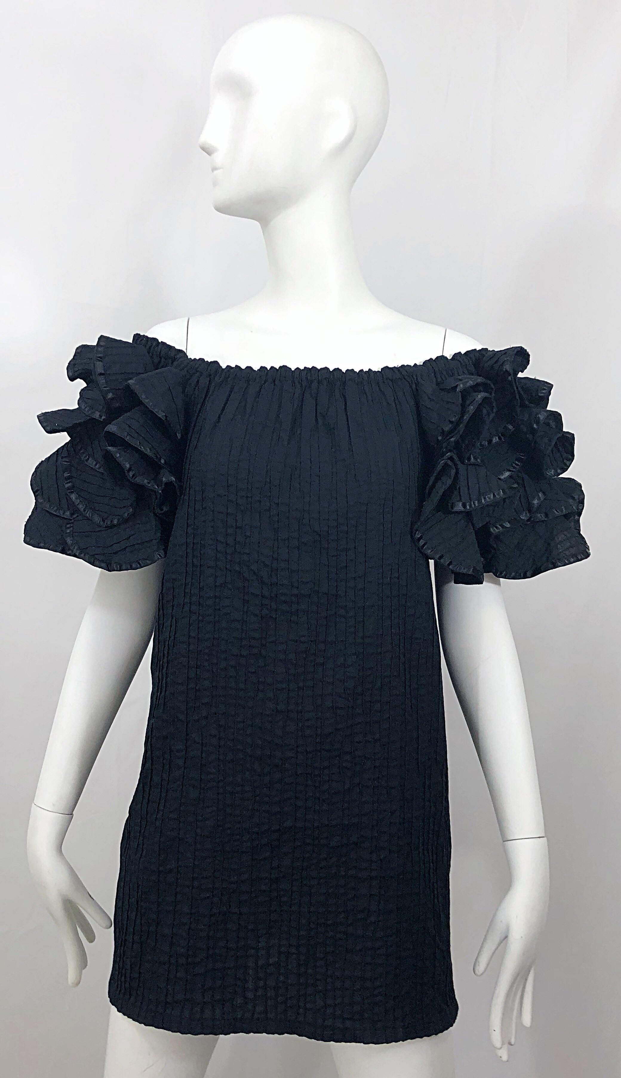 Rare vintage 60s TACHI CASTIO for Pan American black cotton Flamenco style cotton off-the-shoulder shift tunic / mini dress! Features chic Space Age style ruffled sleeves. Buttons up the back. Great belted or alone. Can be worn either as a tunic top