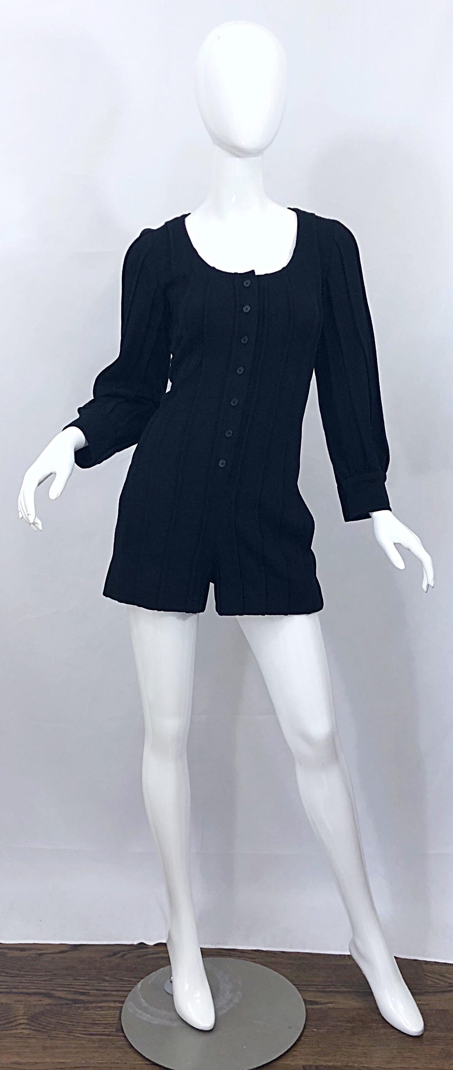 Chic vintage GIVENCHY HAUTE COUTURE black wool long sleeve one piece romper jumpsuit! Features soft black ribbed virgin wool. Buttons up the front. Pockets at each side of the hips. Buttons at each sleeve cuff, which can also be rolled up. Can