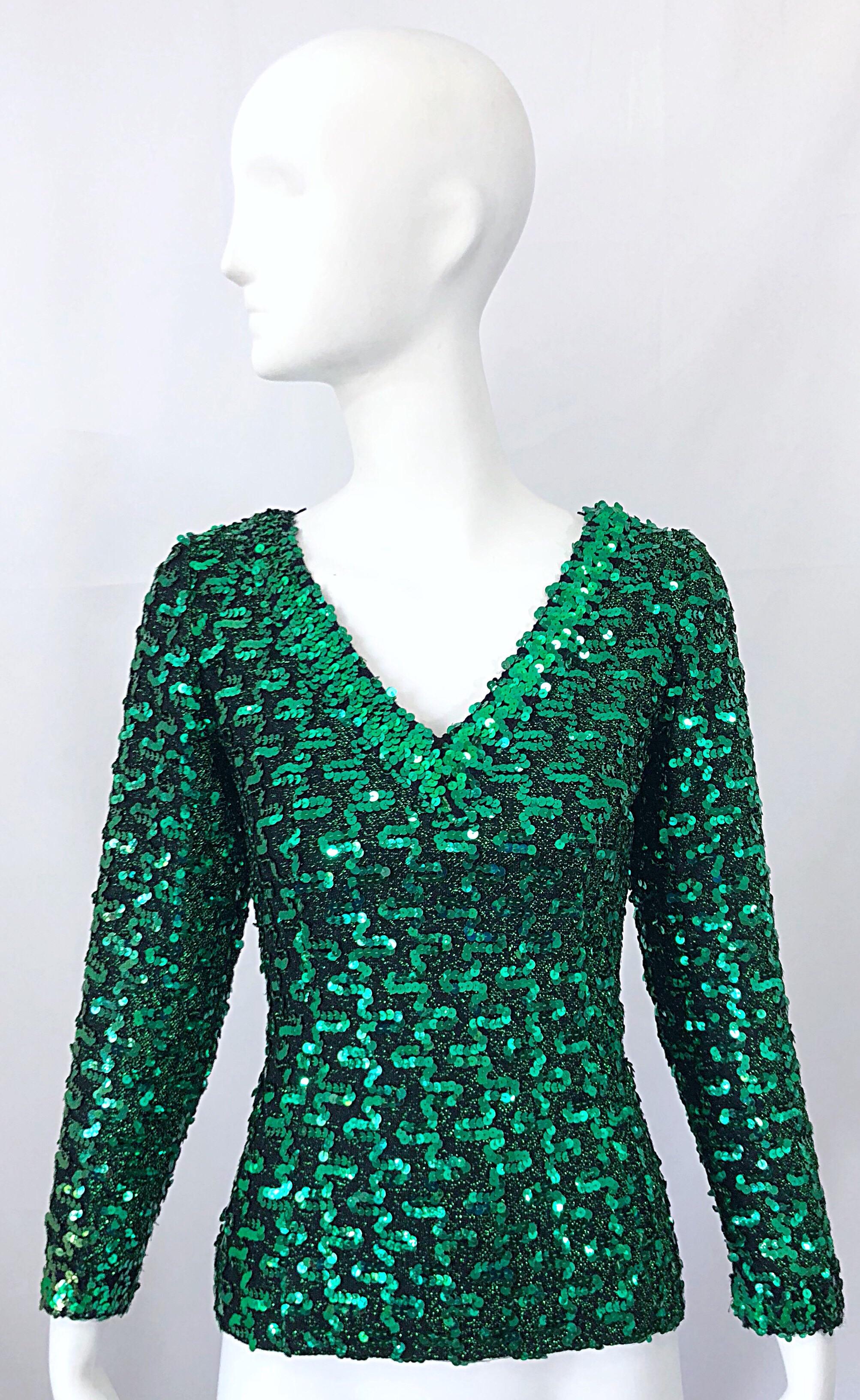 Beautiful, and just in time for the holidays! Vintage 70s LILLI DIAMOND kelly green metallic knit jersey sequined top! Features green metallic jersey with thousands of hand-sewn sequins throughout. Fantastic fit that stretches to fit. Full metal
