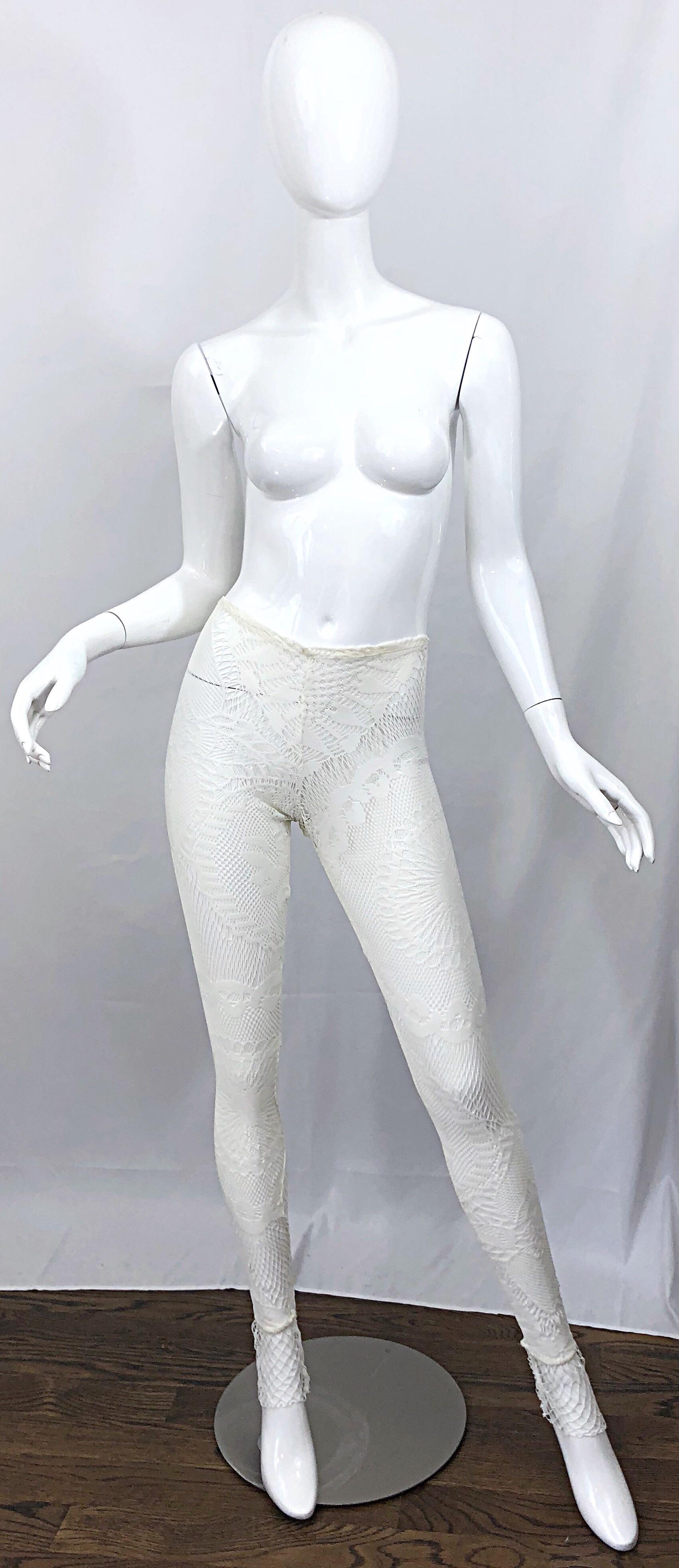 Amazing never worn late 1990s JEAN PAUL GAULTIER white fishnet crochet sheer leggings / stockings! High waist fit with lots of stretch. Fishnet detail at each ankle. Great with shorts, a dress or a skirt. In great unworn condition. Made in