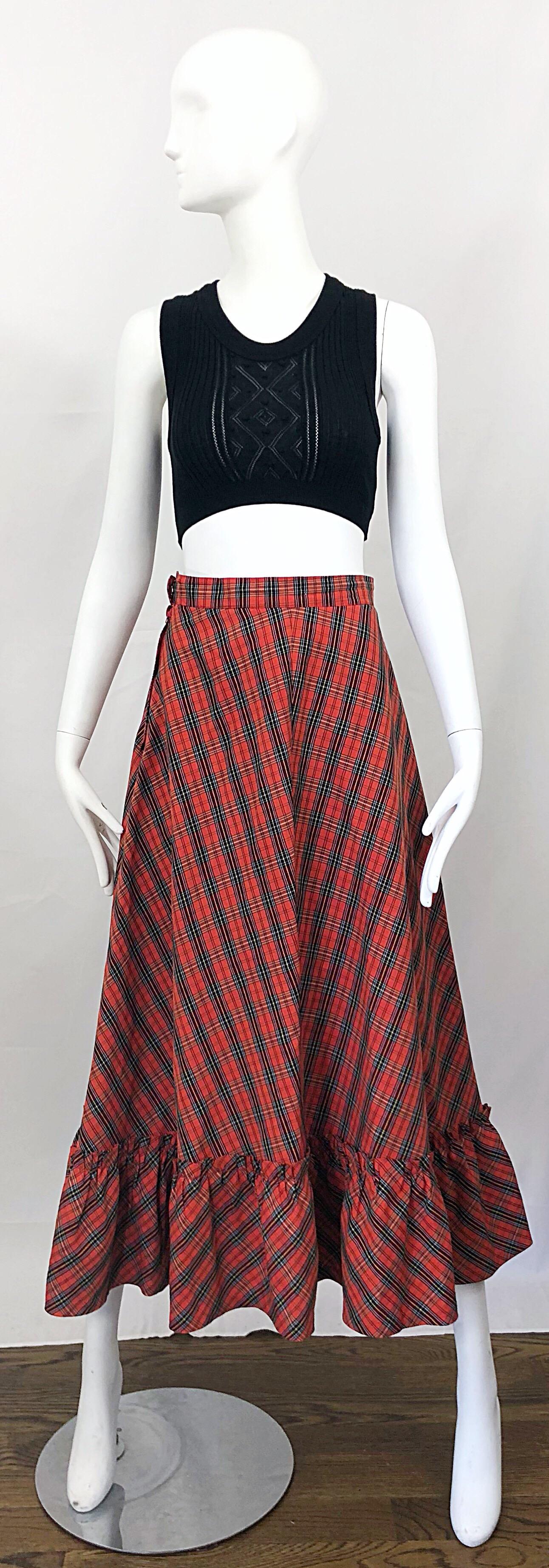 Perfect for the holidays! This red plaid 1970s maxi skirt has so much going for it. Classic plaid that forms a contrast when the fabric meets at the center. Soft cotton voile fabric. Perfect for Christmas / Holidays! Chic ruffle hem. Metal zipper up