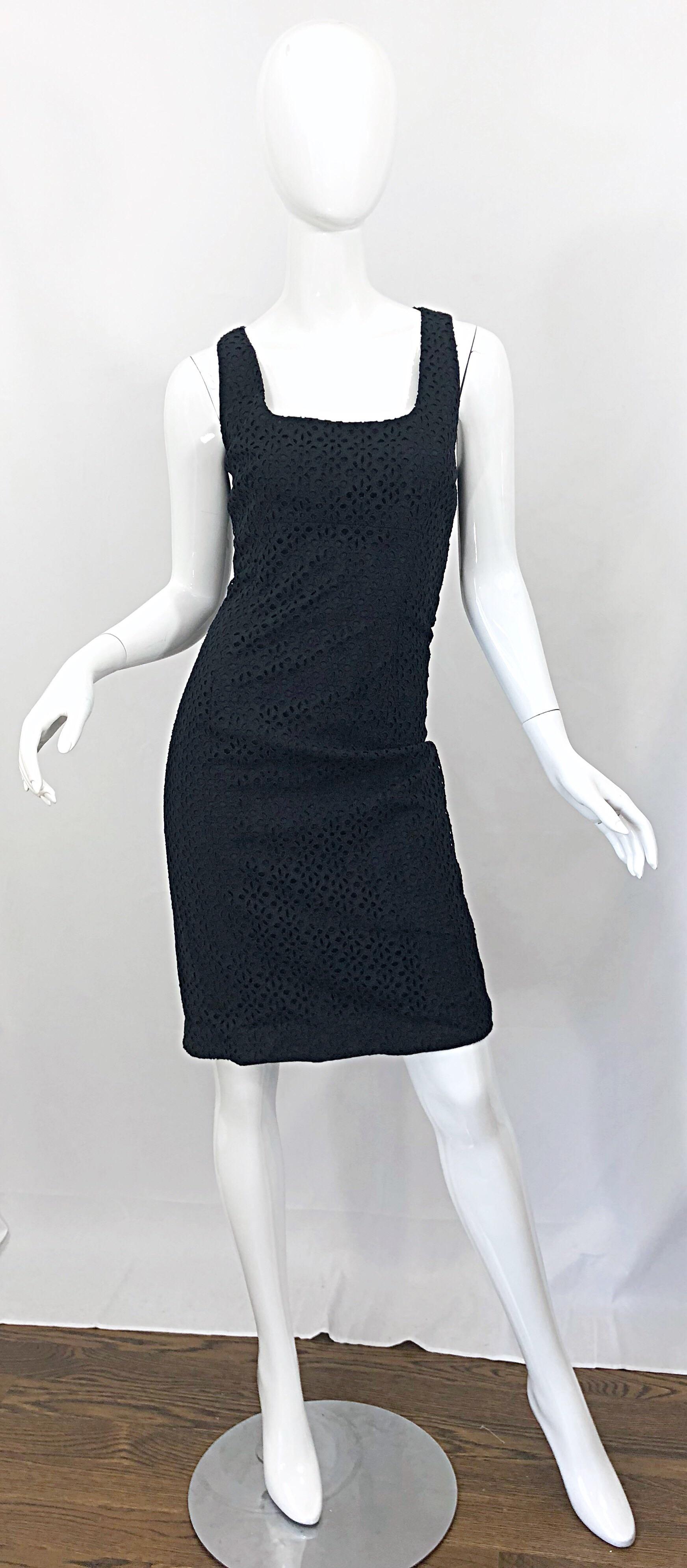 The perfect new MICHAEL KORS COLLECTION Runway Size 10 little black dress! Retailed for $1,895.
 Features a soft cotton with cut-out eyelets throughout. Wonderful flattering fit hides any 'problem' areas. Hidden zipper up the back with hook-and-eye